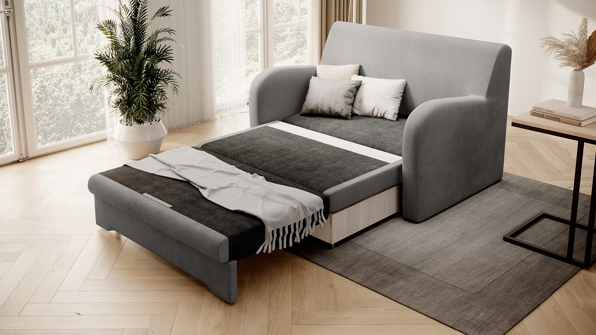 Szara sofa Ario rozłożona do spania, ujęcie skośne w salonie przy oknie.