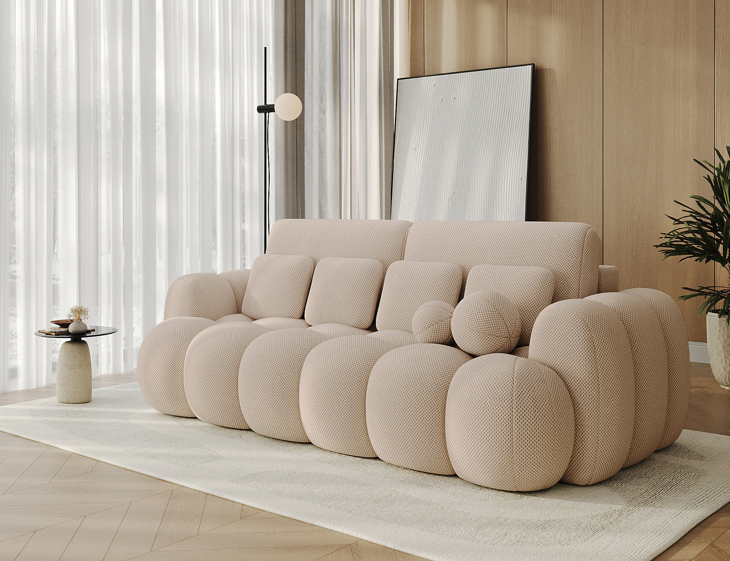 Cotonn Calmora 18 – beżowa sofa modułowa w eleganckim wnętrzu, łączy nowoczesność z komfortem i subtelną przytulnością.