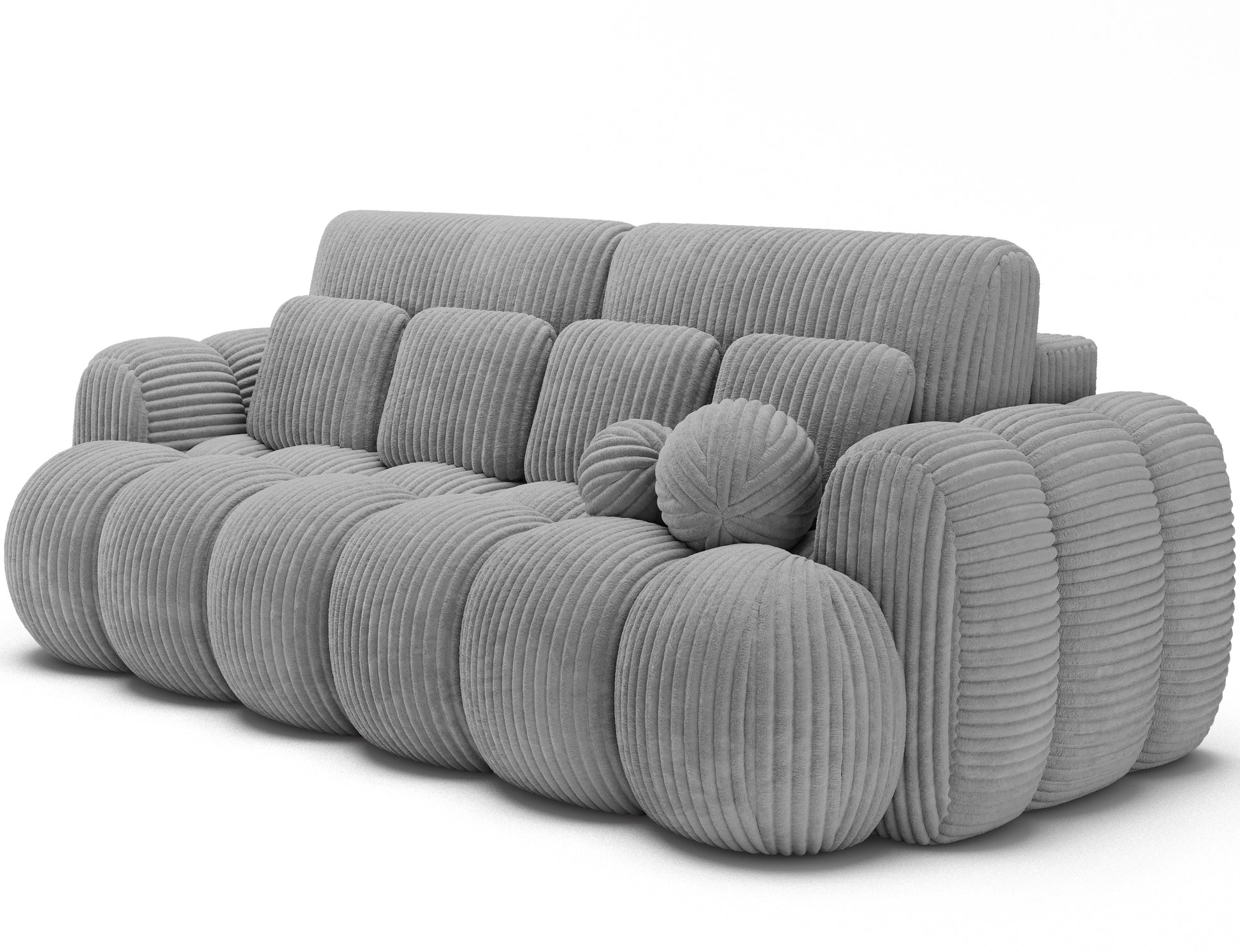 Modullo 03 – jasnoszara sofa o obłych kształtach, miękkie poduchy i welurowy sztruks. Komfortowy design z nutą finezji.