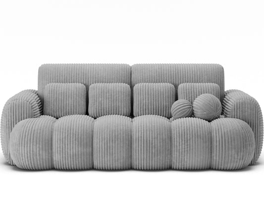 Sofa Cotonn Modullo – miękkie oparcie, sztruksowa tkanina i poduszki dla wyjątkowego komfortu w jasnoszarej odsłonie.
