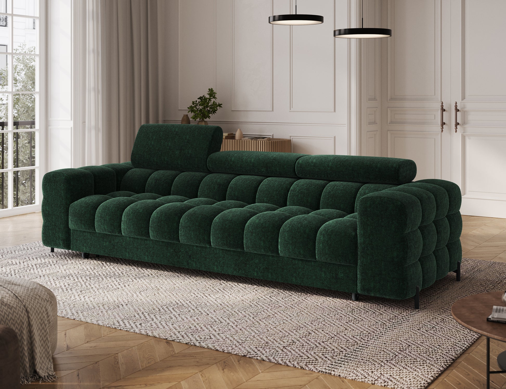 Sofa Festello Amore 35 zielony – widok ukośny prezentujący funkcję spania, regulowane zagłówki i nowoczesne, miękkie formy.