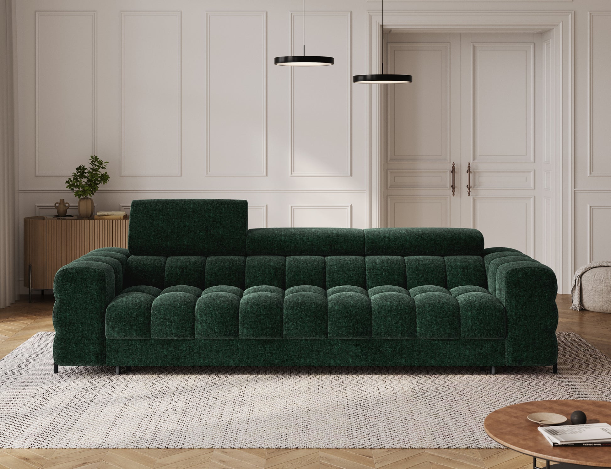 Sofa Festello Amore 35 zielony – widok od frontu w aranżacji salonu; funkcja spania, regulowane zagłówki i nowoczesne pikowania.
