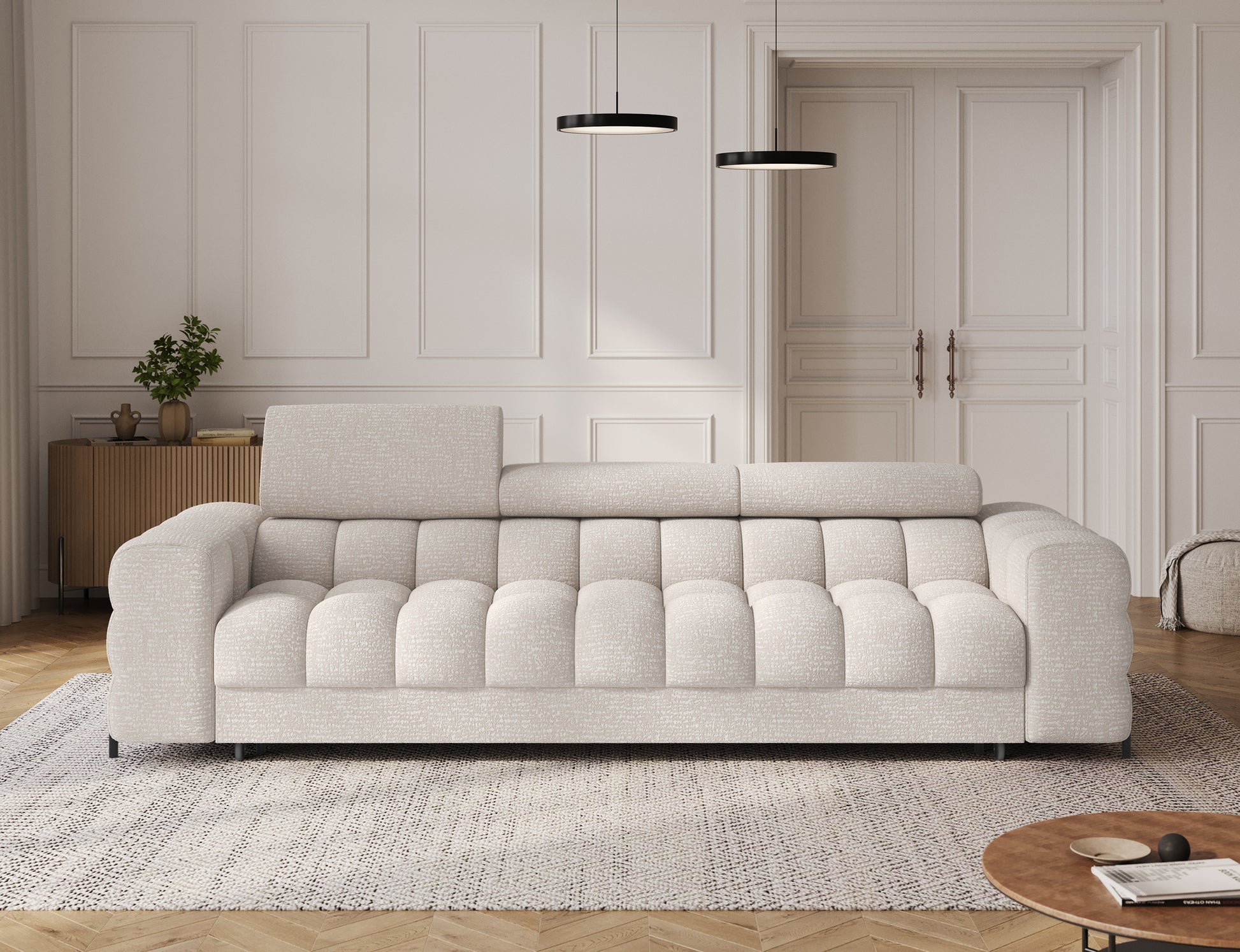 Sofa Festello Baffix 20 beżowa w widoku frontalnym, eleganckie pikowania i minimalistyczne nogi w czerni.