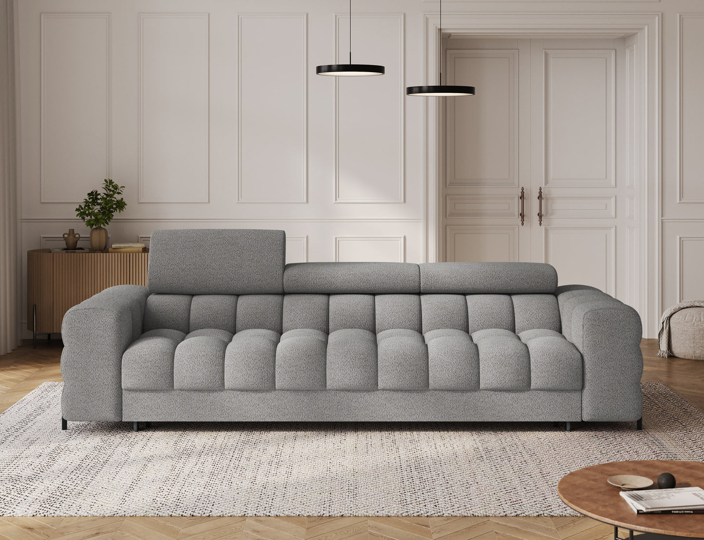 Sofa Festello Royal 04 szara – nowoczesna kanapa z funkcją spania i eleganckim designem w aranżacji salonu.