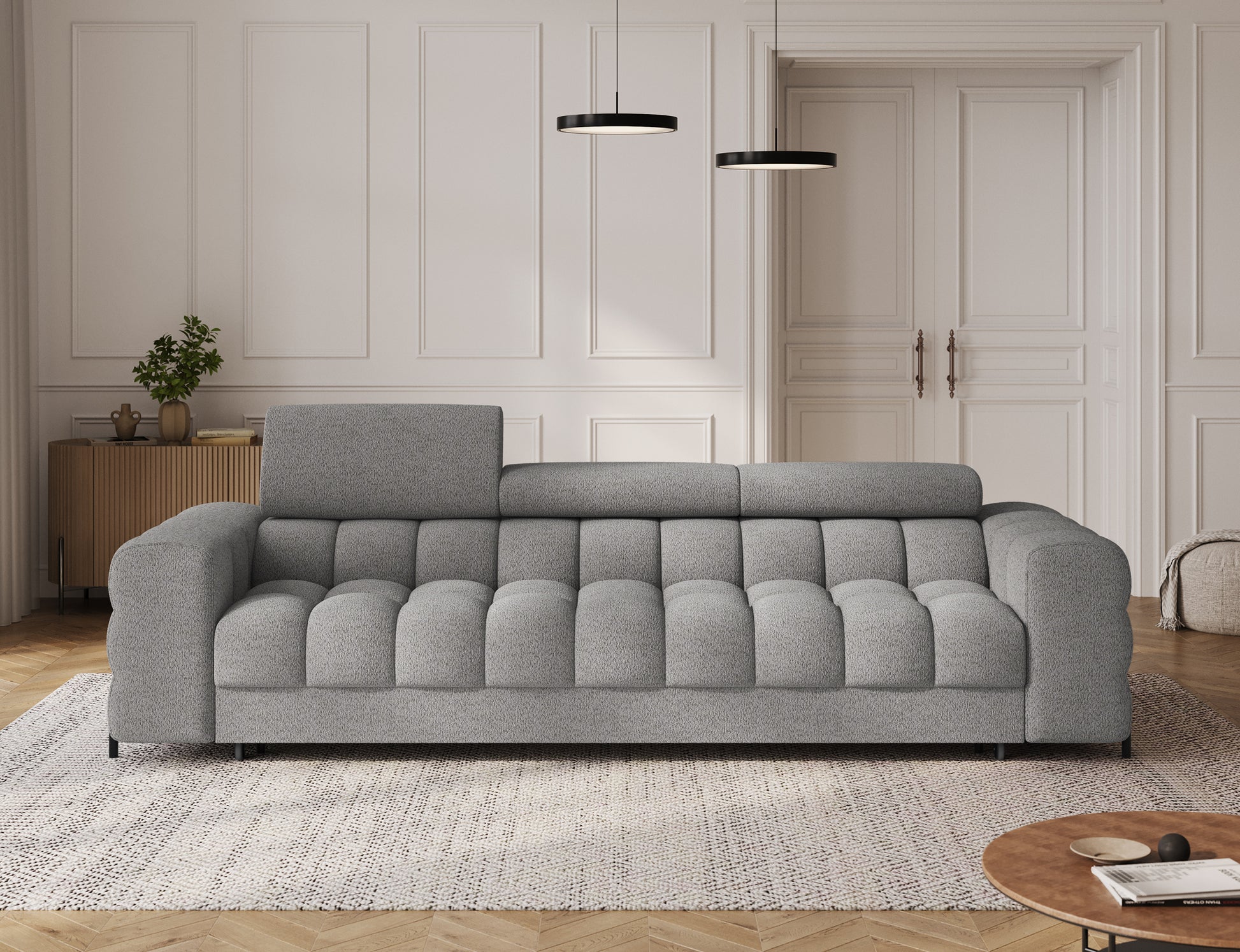 Sofa Festello Royal 04 szara – nowoczesna kanapa z funkcją spania i eleganckim designem w aranżacji salonu.