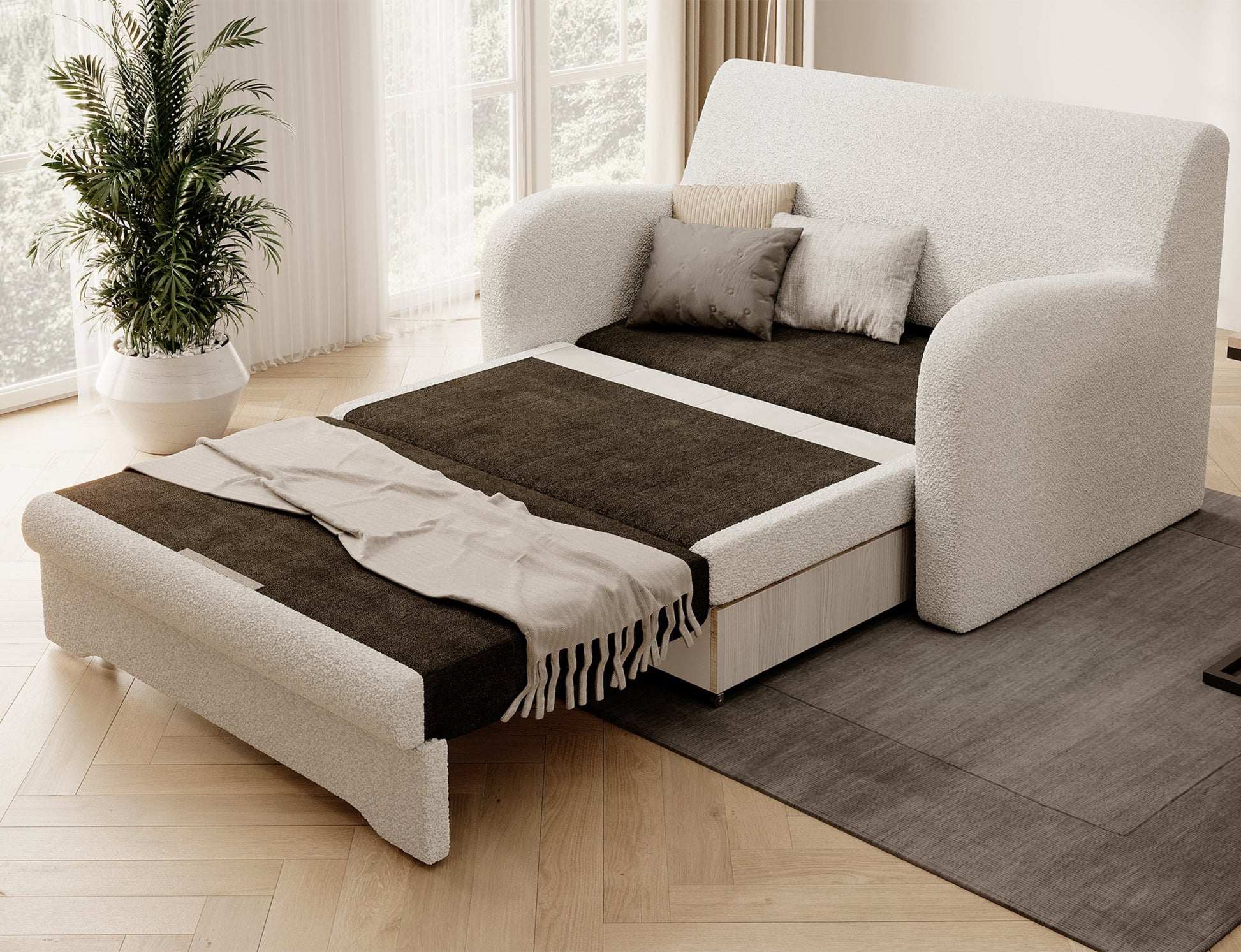 Biała sofa Jarell w tkaninie bouclé, rozłożona do spania, ujęcie skośne w salonie na dywanie, przy oknie z rośliną.