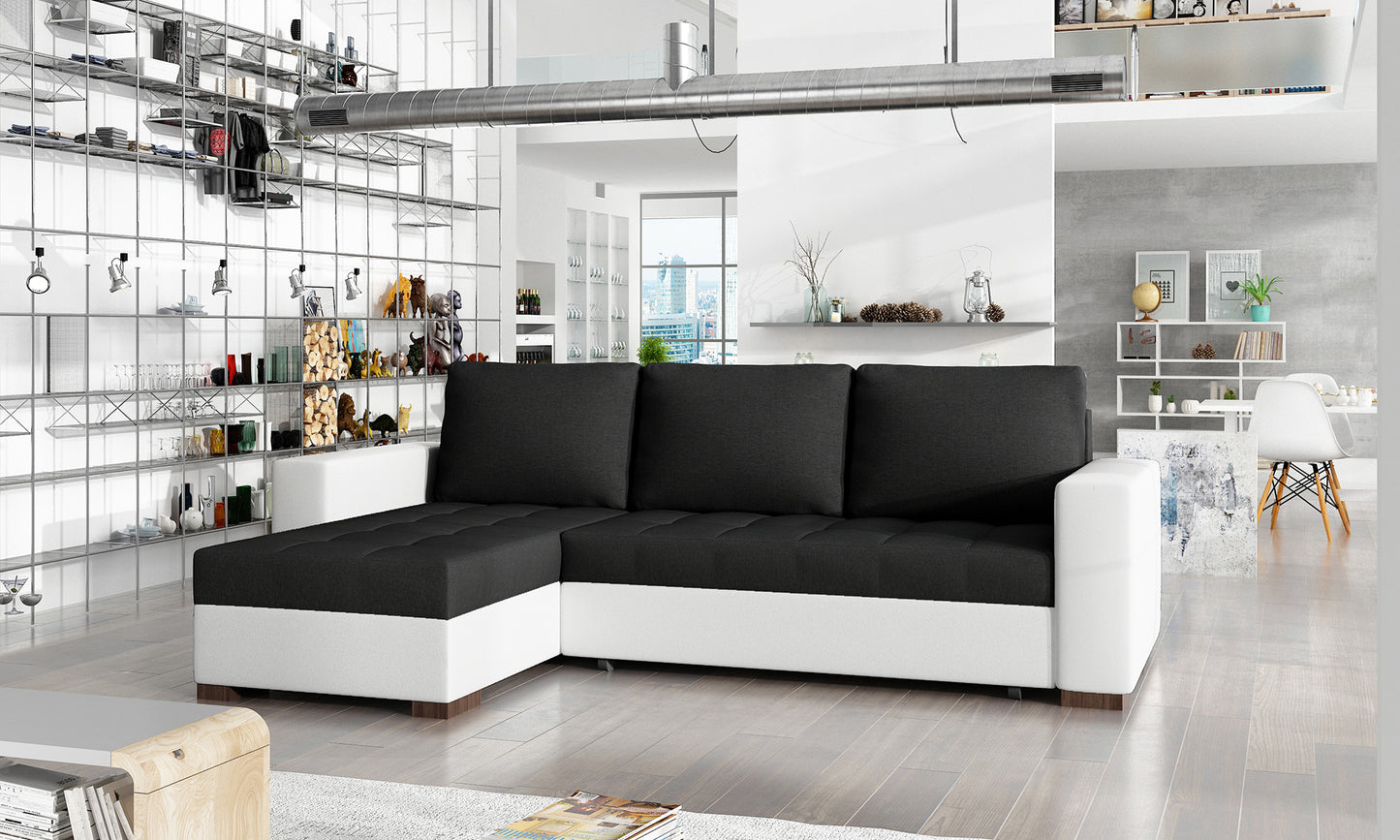 Uniwersalny narożnik z funkcją spania Newark wykonany w tkaninie Sawana 14 i Soft 17 prezentujący minimalistyczną formę oraz pikowane siedzisko. Designerski mebel wypoczynkowy do nowoczesnych i kontrastowych wnętrz.