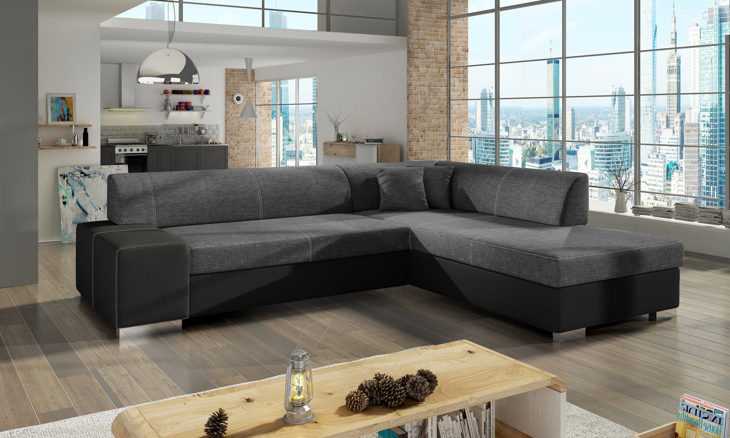 Ciemnoszaro-czarna sofa narożna Porto wykonana z materiałów Sawana 05 i Soft 11 w układzie prawym to idealny wybór do wnętrz nowoczesnych i loftowych, zapewniający komfort użytkowania oraz stylowy wygląd