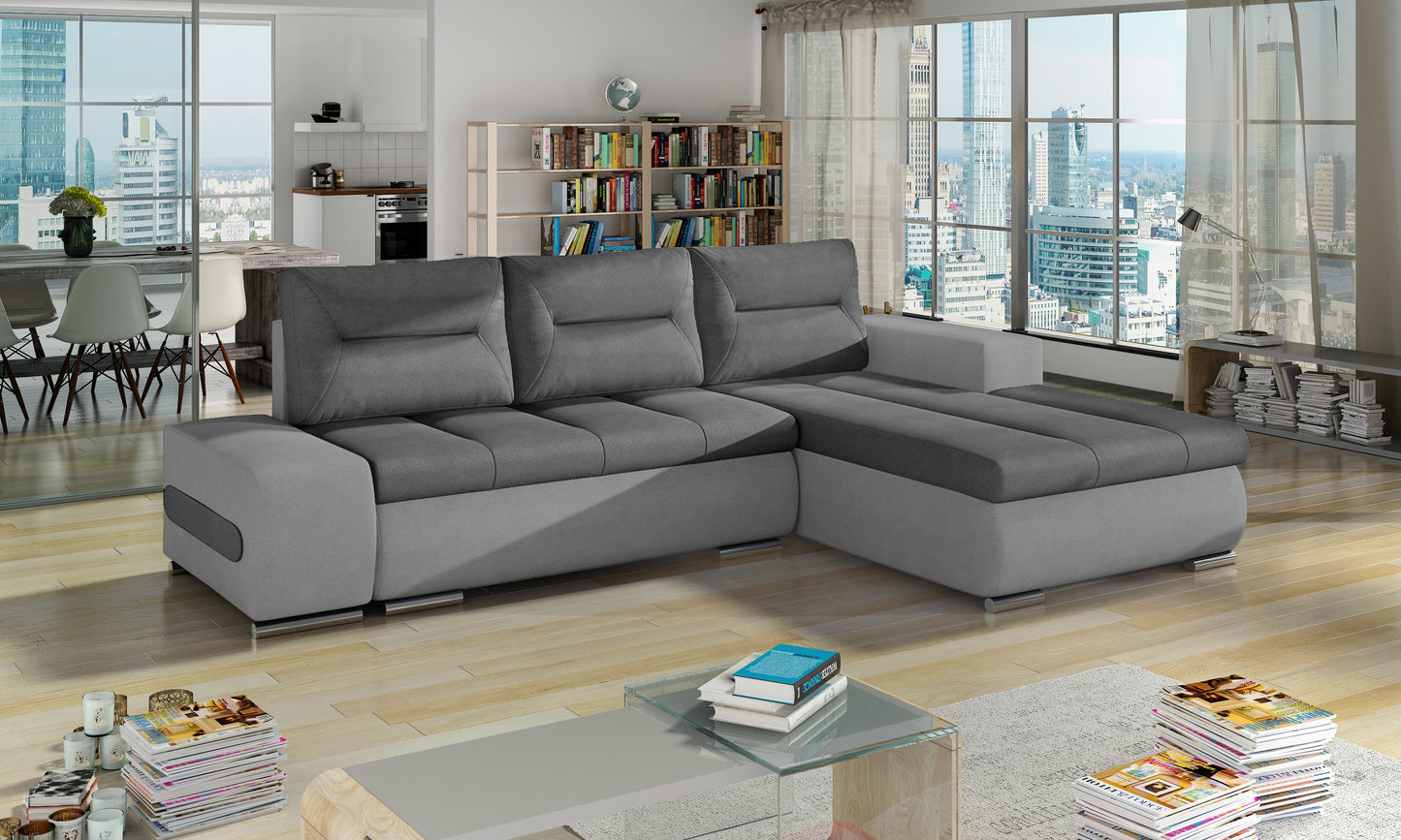 Narożnik Ottavio w układzie prawym, tkanina Soro 93 szary i Soro 83, w nowoczesnym salonie z dużymi oknami.
