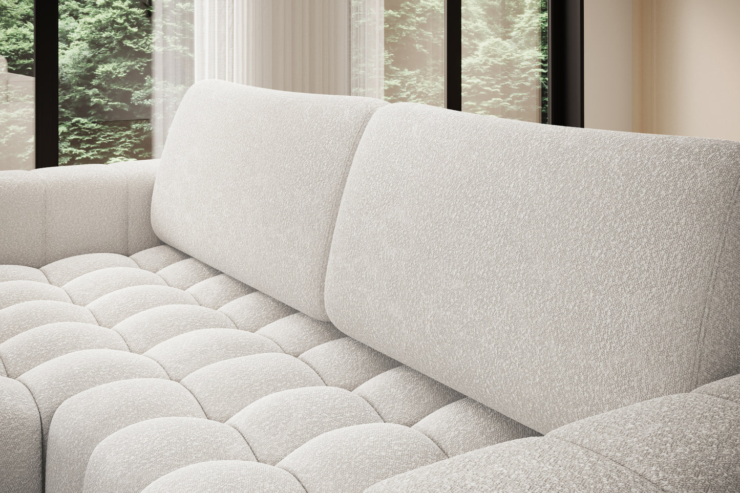 Zbliżenie na miękkie, pikowane siedzisko narożnika Bonett w białej tkaninie.