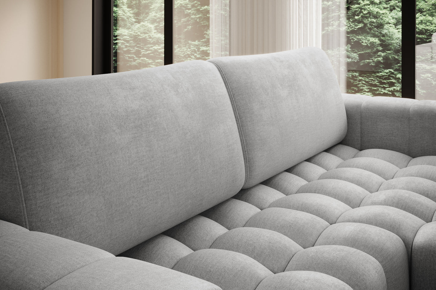 Zbliżenie na miękkie, pikowane siedzisko narożnika Bonett – Monolith 84.