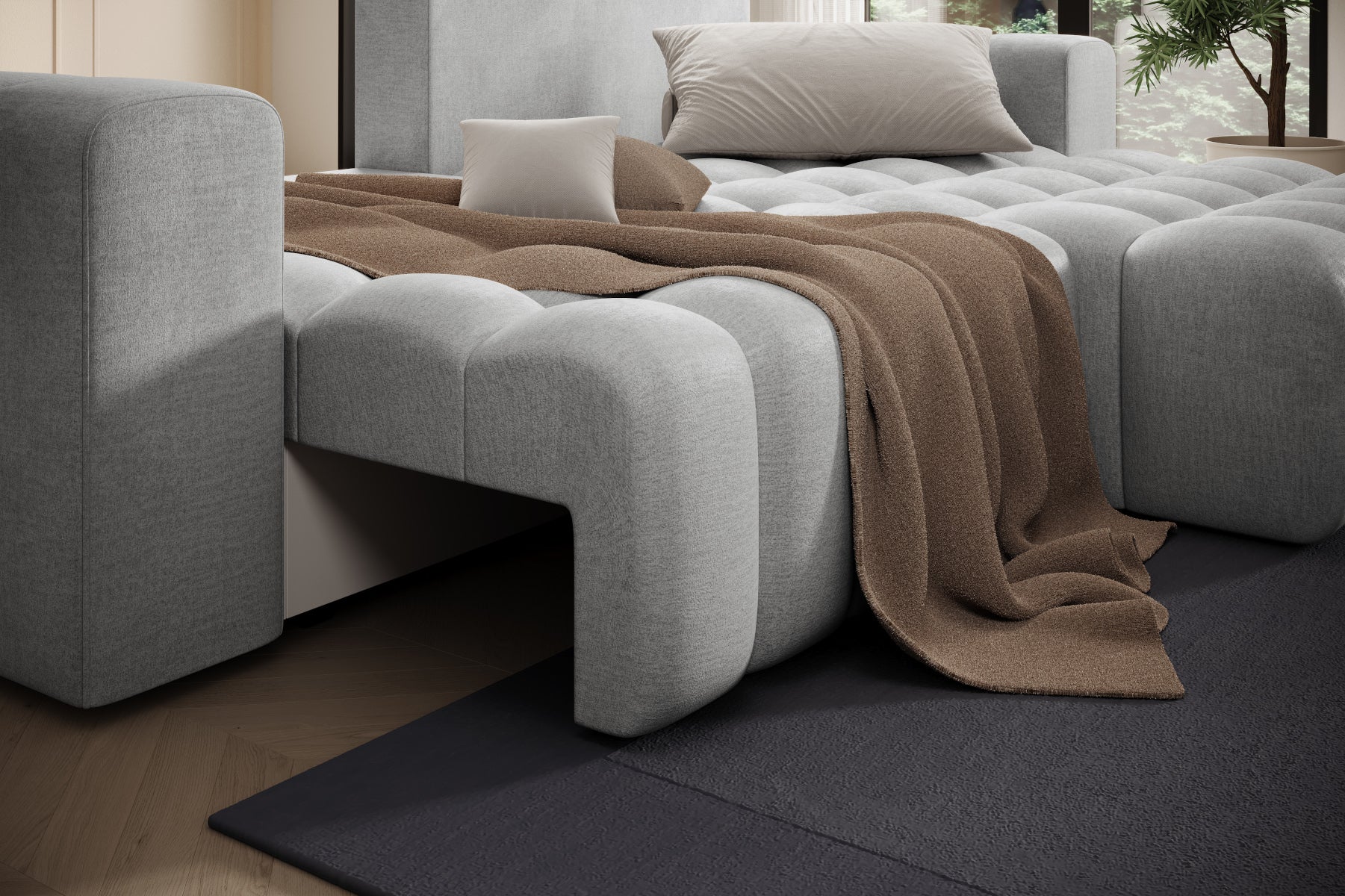 Detal oparcia i przeszyć tapicerki narożnika Bonett w tkaninie Monolith 84.