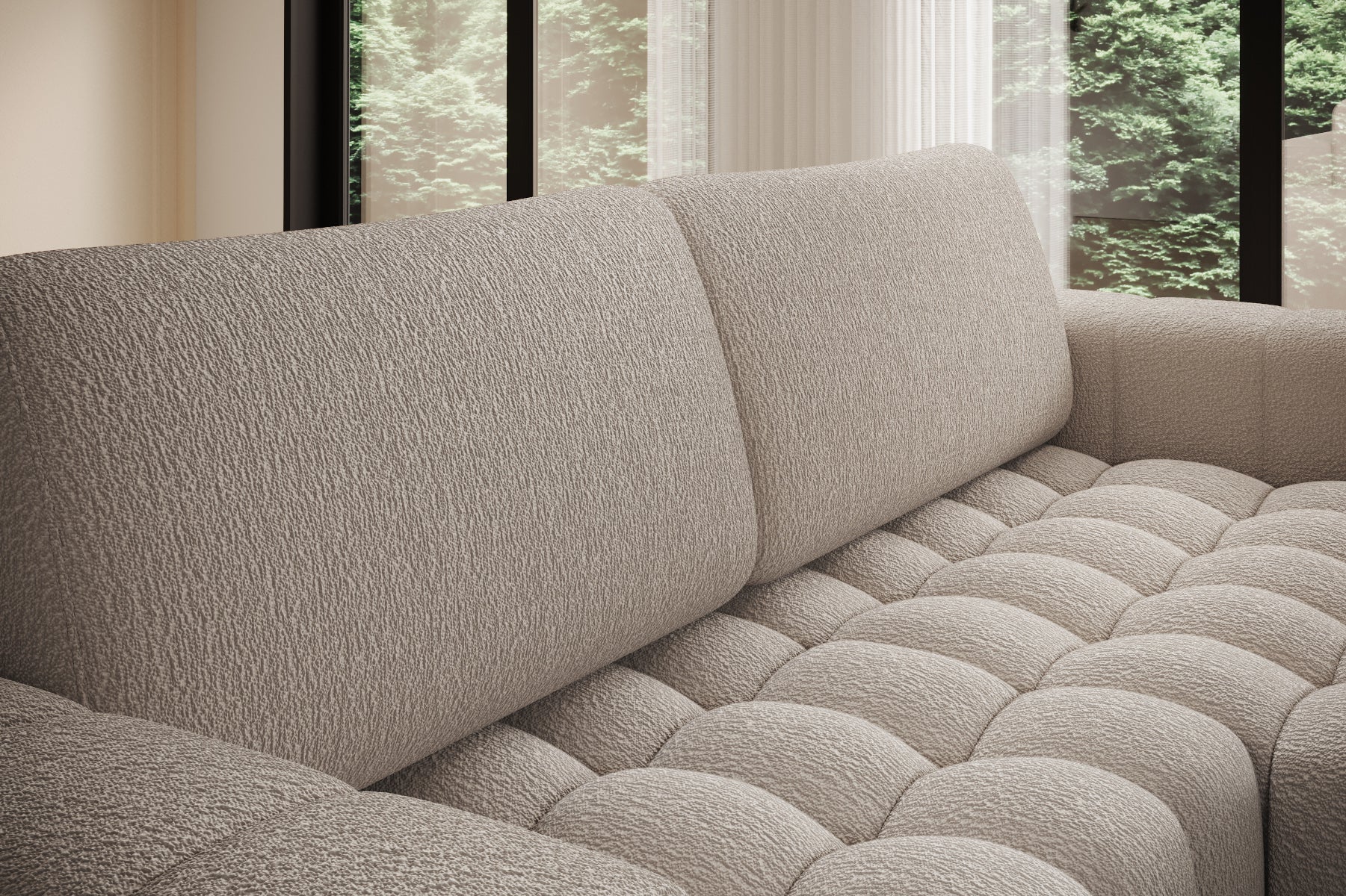 Zbliżenie na miękkie, pikowane siedzisko narożnika Bonett w beżowej tkaninie.