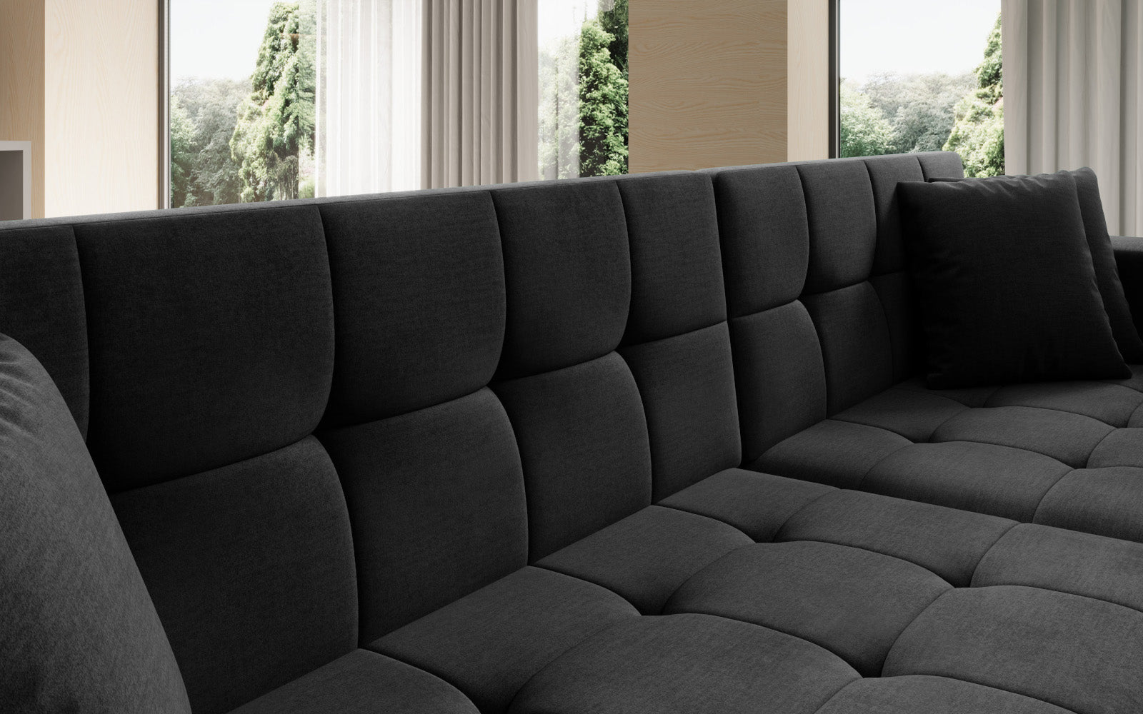 Duży narożnik Solange prawy w tkaninie Monolith 97 w kolorze ciemnoszarym to komfortowa sofa wypoczynkowa, która łączy elegancki styl z funkcjonalnością i wygodą użytkowania.