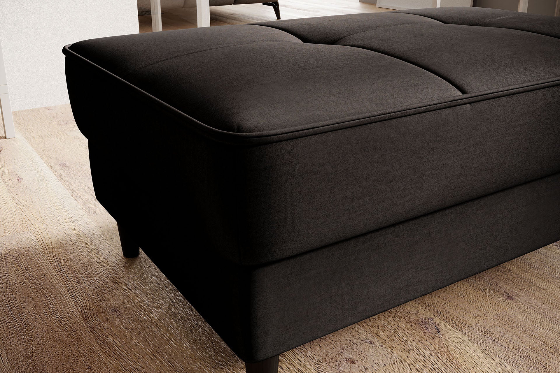 Tapicerowana pufa Bellis Nube 22 w brązowym odcieniu świetnie sprawdzi się jako podnóżek lub dodatkowe siedzisko. Prosty design dobrze wpisuje się w aranżacje modern i loft.