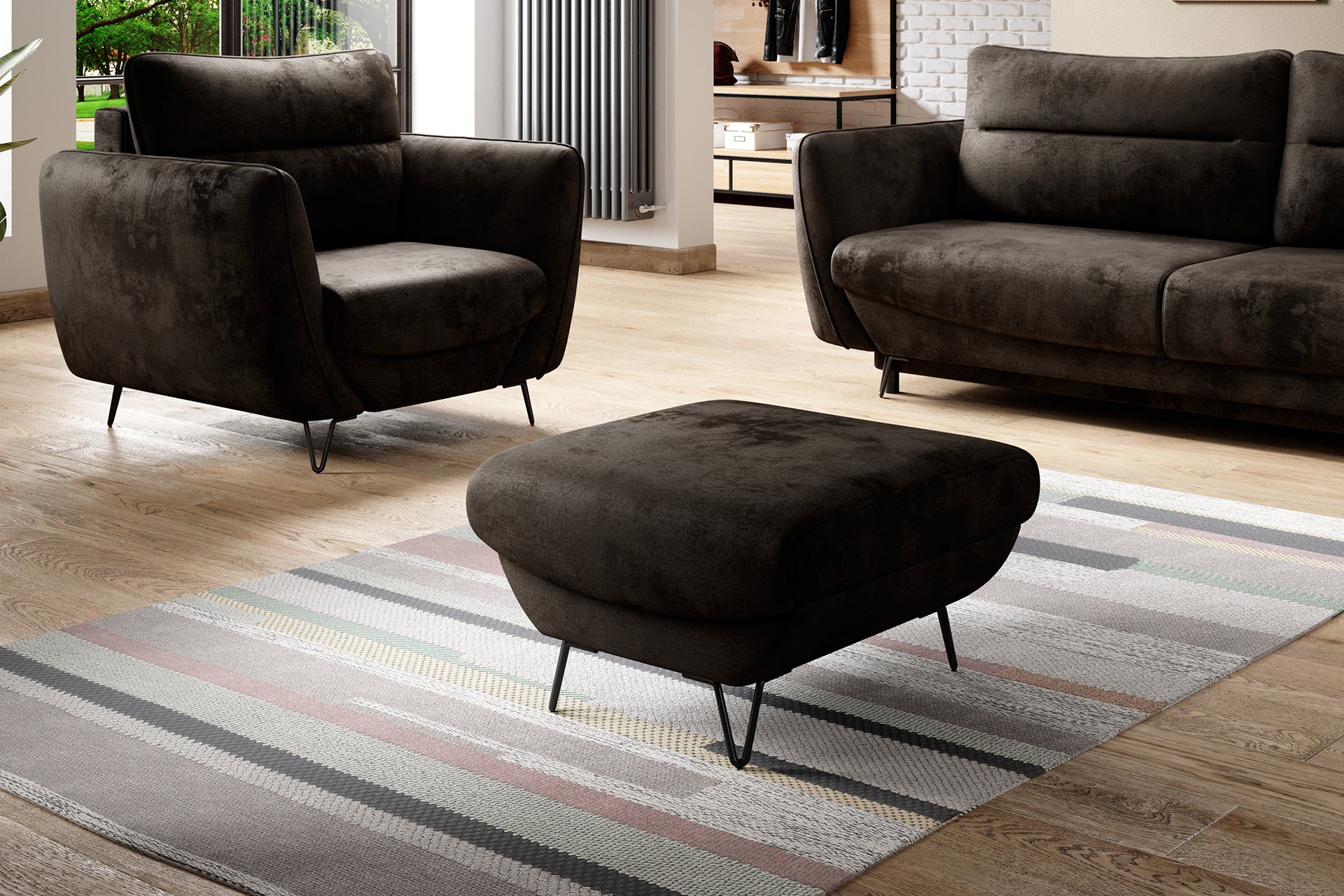 Brązowa pufa Silva Nube 22 z zaokrągloną bryłą doskonale sprawdzi się w salonie lub strefie relaksu. Minimalistyczna forma podkreśla elegancki wygląd całego mebla.