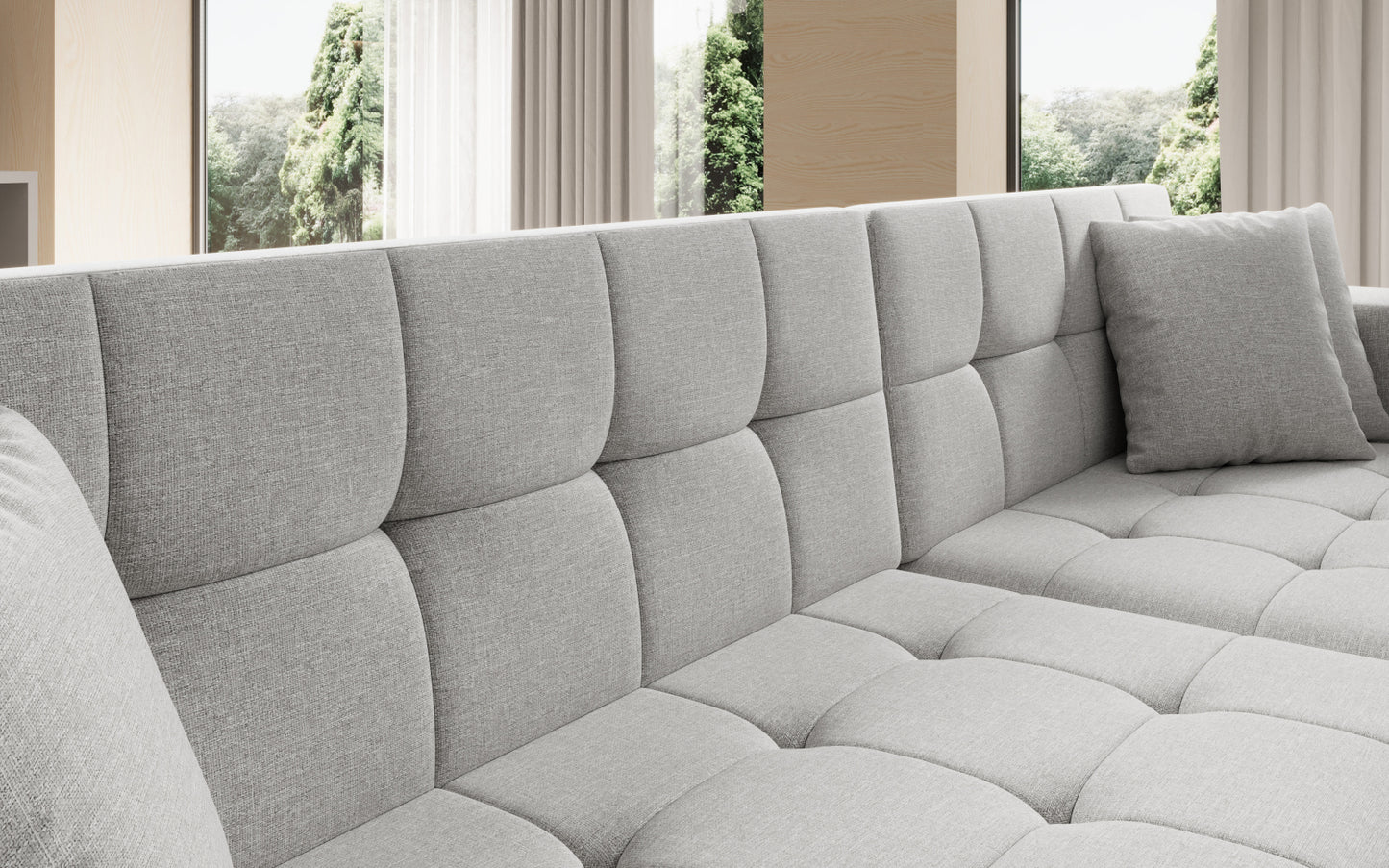 Duży narożnik Solange prawy w tkaninie Cover 02 w kolorze jasnoszarym to wygodna sofa wypoczynkowa, która łączy funkcjonalność z eleganckim i uniwersalnym wyglądem wnętrza.