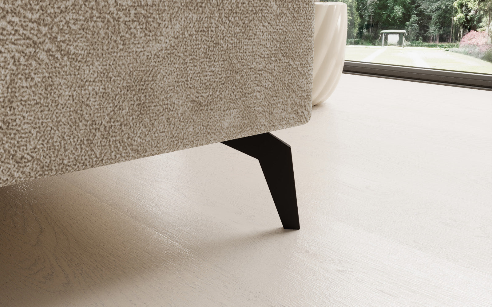 Beżowy narożnik Solange Dora 21 prawostronny to designerski mebel do salonu, który dzięki miękkim poduszkom i stonowanej kolorystyce tworzy przytulną, nowoczesną strefę wypoczynku.