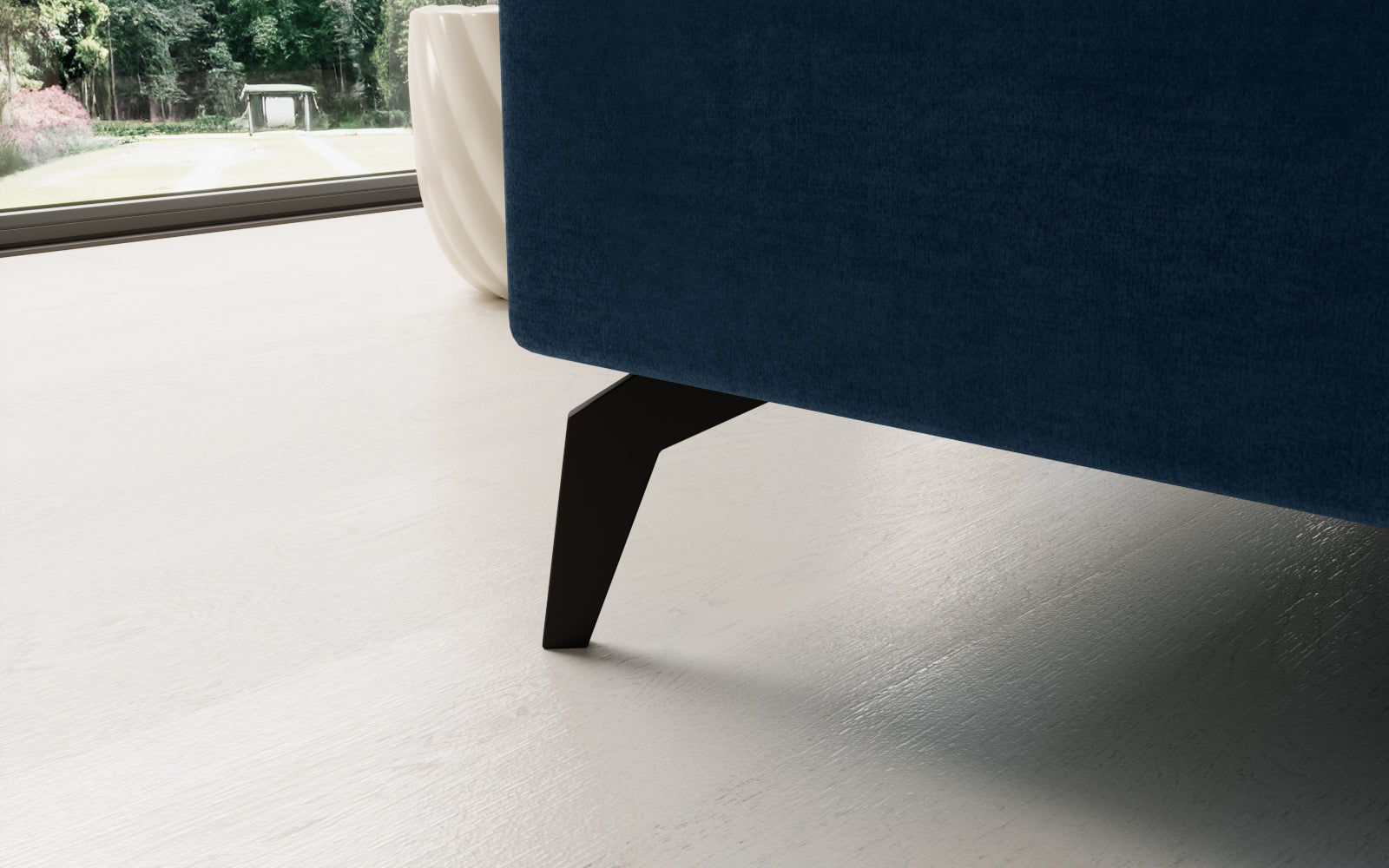 Granatowy narożnik Solange Monolith 77 lewostronny to designerski mebel do salonu, który dzięki miękkim poduszkom i dopracowanym detalom tworzy nowoczesną, przytulną strefę wypoczynku.