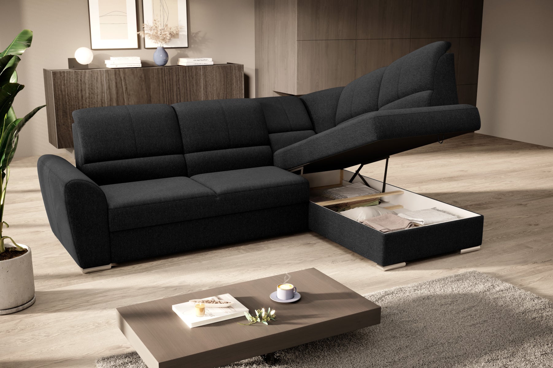 Duży narożnik Siber prawy w tkaninie Flores 10 w kolorze czarnym to komfortowa sofa wypoczynkowa do salonu, która łączy funkcjonalność z eleganckim designem pasującym do wielu wnętrz.