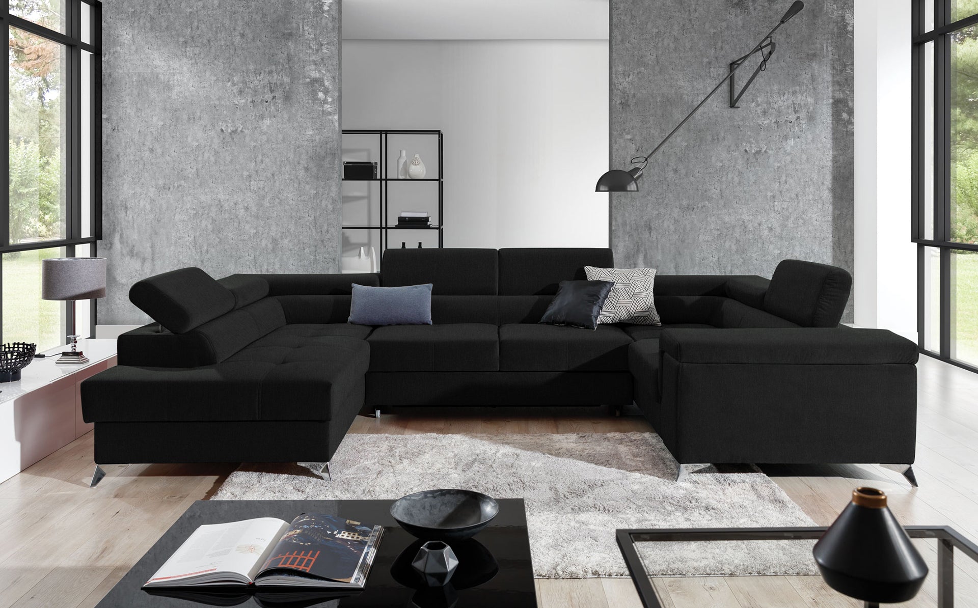 Nowoczesny narożnik Thiago w kolorze czarnym z eleganckimi metalowymi nóżkami i szerokimi siedziskami doskonale sprawdzi się w salonie urządzonym w stylu loftowym, minimalistycznym lub industrialnym. Stylowy narożnik do nowoczesnych wnętrz łączy wygodę z funkcjonalnością.