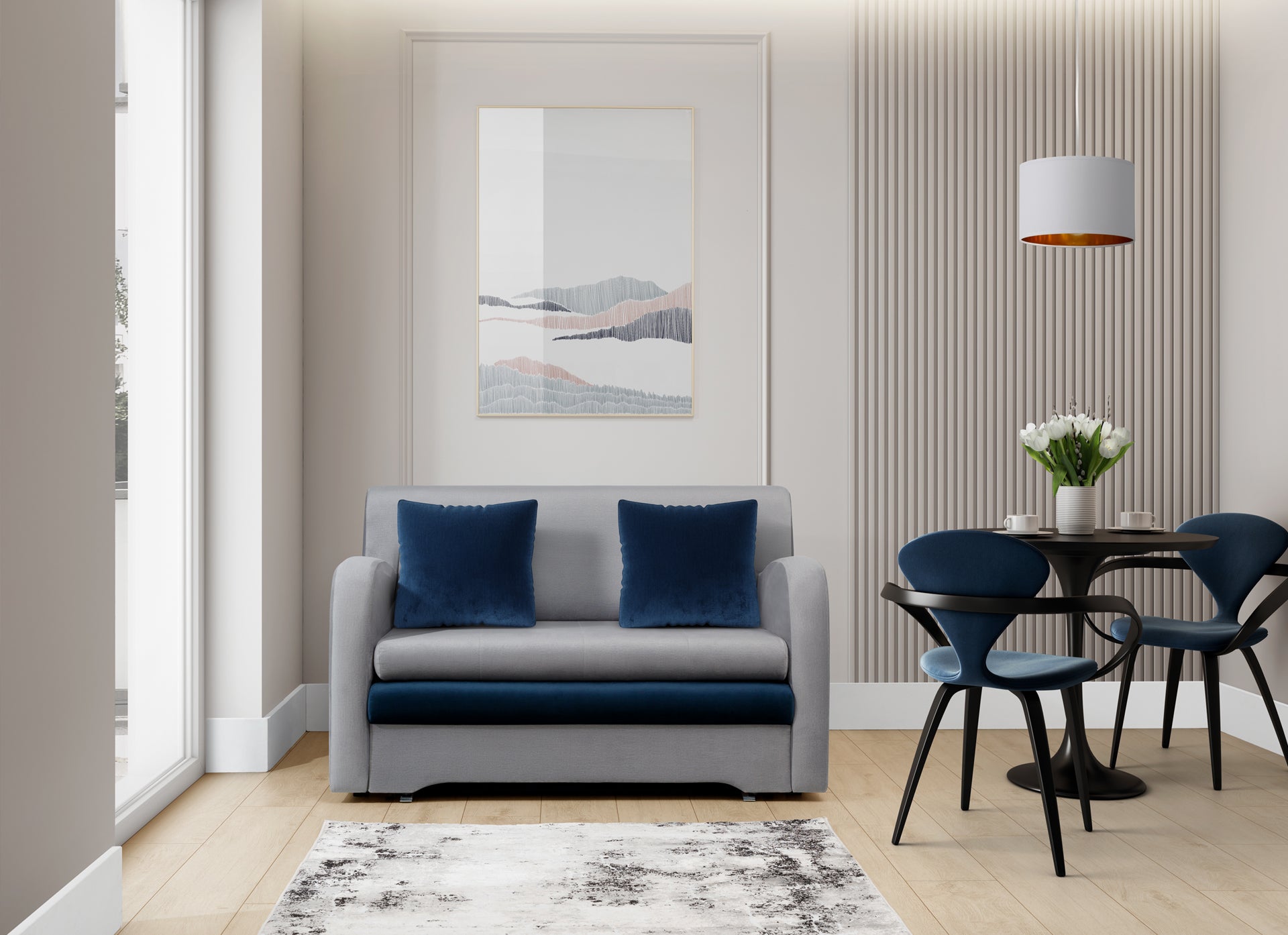 Wnętrze z dywanem Bardot Grey, szarą sofą i granatowymi krzesłami – stylowa, jasna aranżacja salonu.