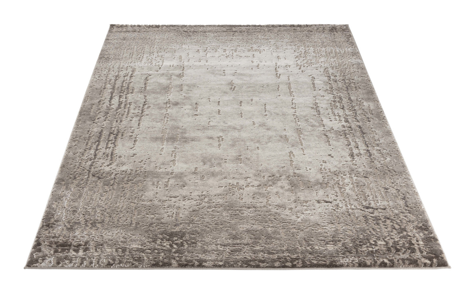 Dywan Codrila Beige 120x180 cm widziany z góry, prezentujący subtelny, strukturalny wzór inspirowany fakturą betonu.