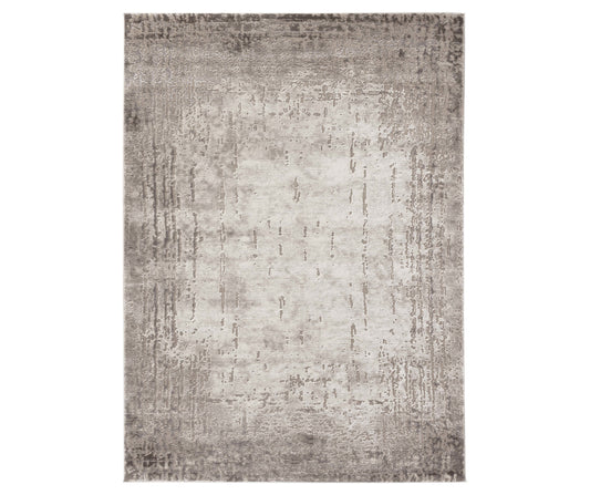 Dywan Codrila Beige 80x150 cm o eleganckim wzorze w odcieniach beżu i brązu, z delikatnym efektem postarzenia.