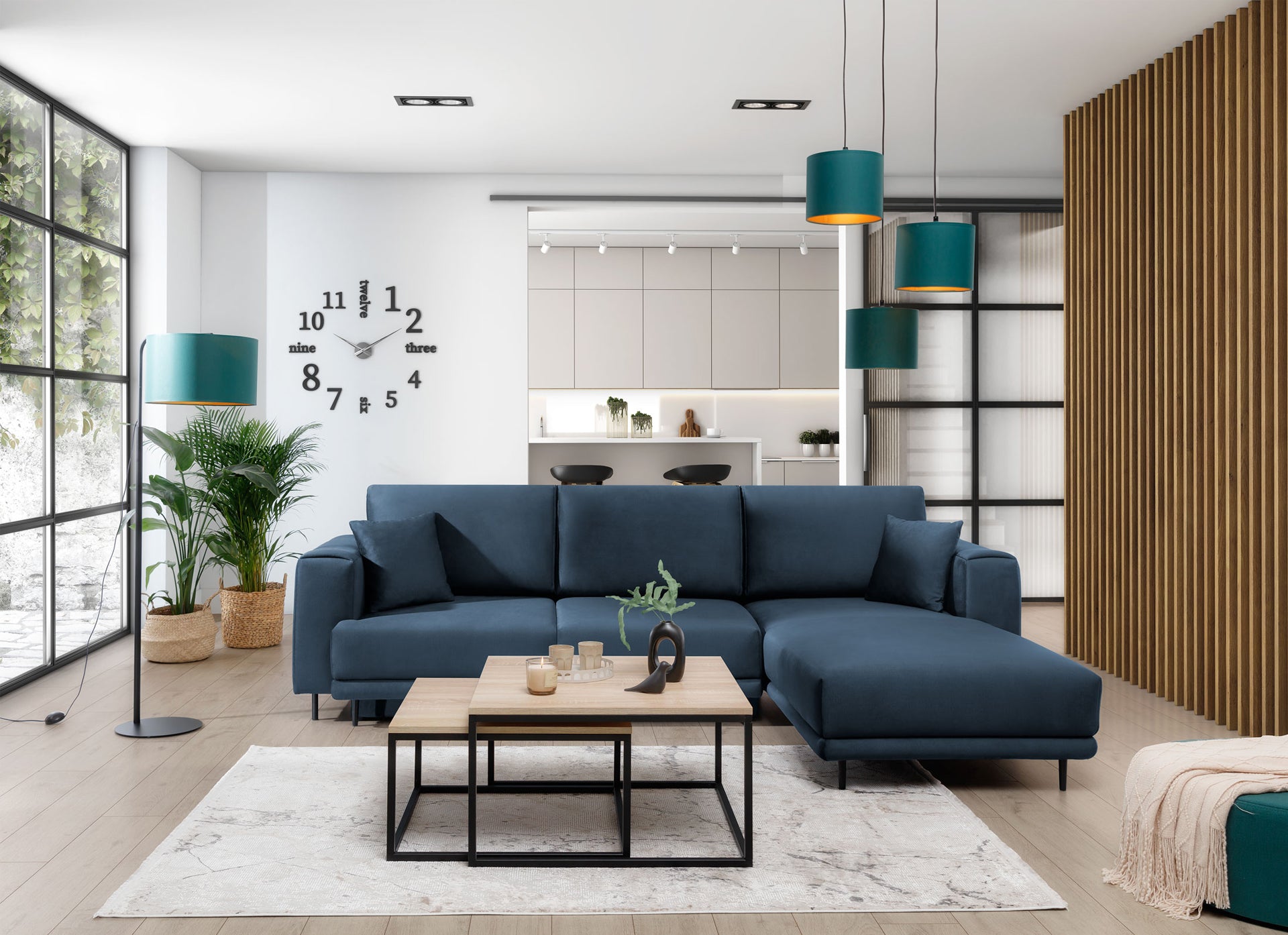 Dywan Collymore Beige 160x230 cm w nowoczesnym salonie z granatowym narożnikiem, stolikiem kawowym i lampami w kolorze butelkowej zieleni.