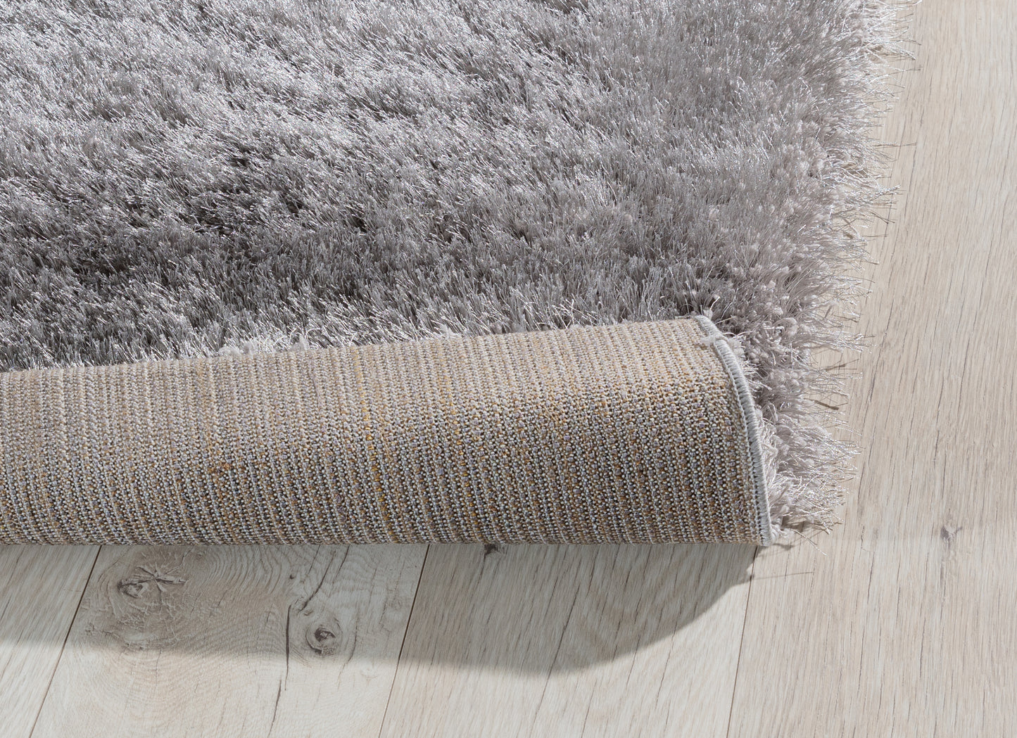 Dywan shaggy Blodwen Grey 120×180 cm – zwinięty dywan, widoczny spód