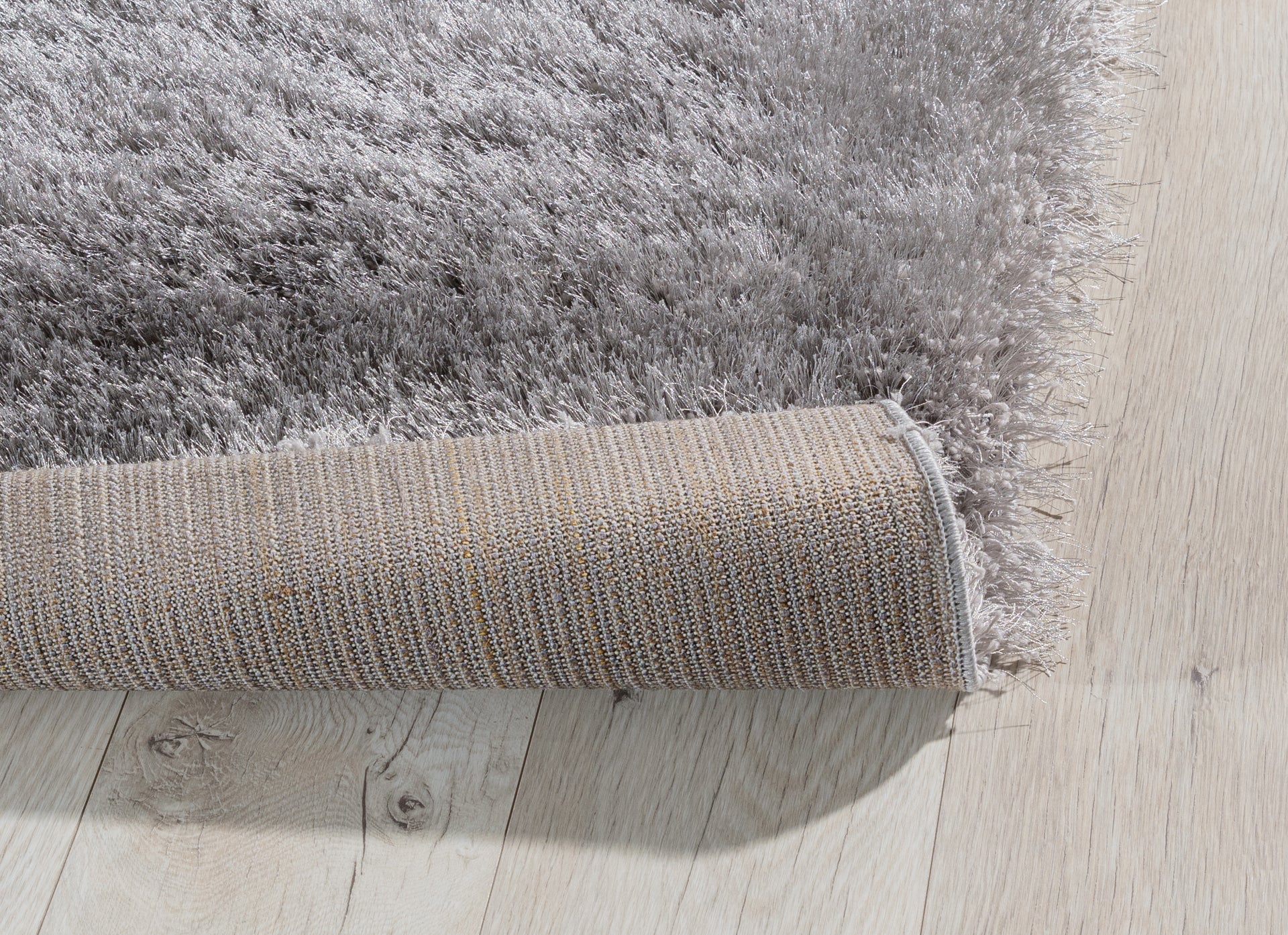 Dywan shaggy Blodwen Grey 120×180 cm – zwinięty dywan, widoczny spód