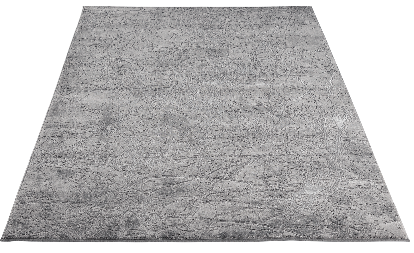 Dywan Siggi Grey 80x150 cm w perspektywie – elegancka szara powierzchnia z subtelnym wzorem o efekcie postarzenia.