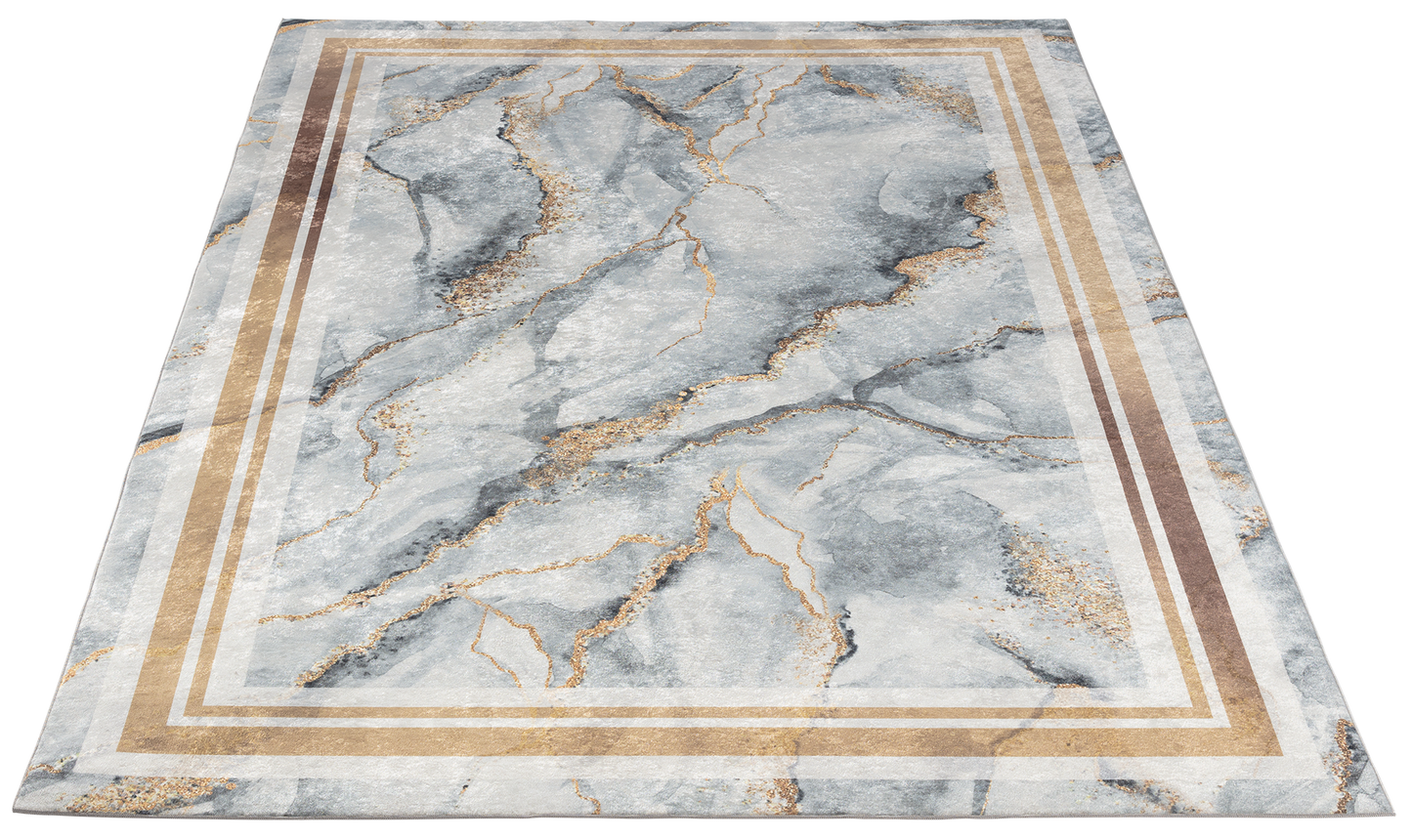 Dywan Squitta Grey 80x150 cm w perspektywie – elegancki marmurowy wzór w odcieniach szarości i beżu z dekoracyjną ramą.