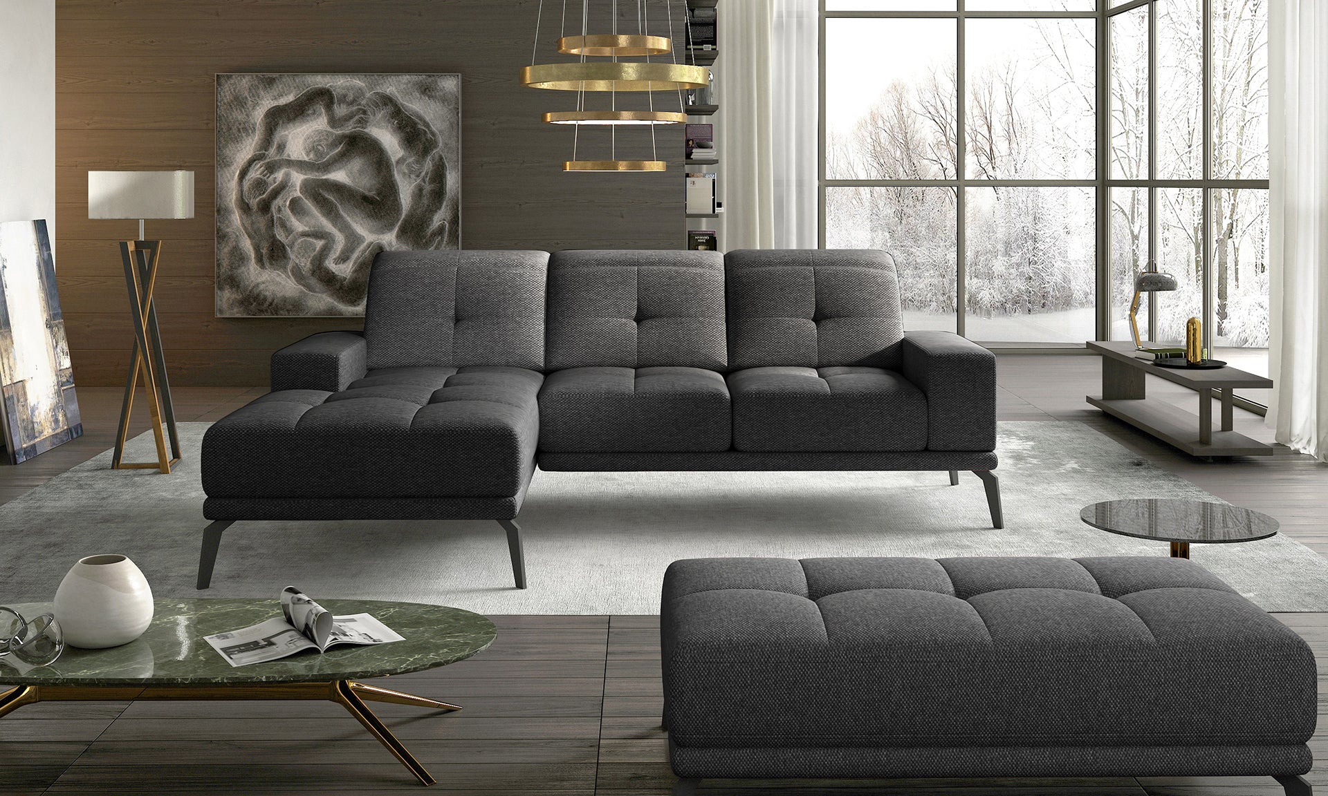 Grafitowy narożnik do salonu wykonany w tkaninie Inari 96 prezentujący minimalistyczną formę oraz miękkie siedziska. Designerski narożnik świetnie komponujący się z drewnianymi dodatkami i nowoczesnymi aranżacjami wnętrz.