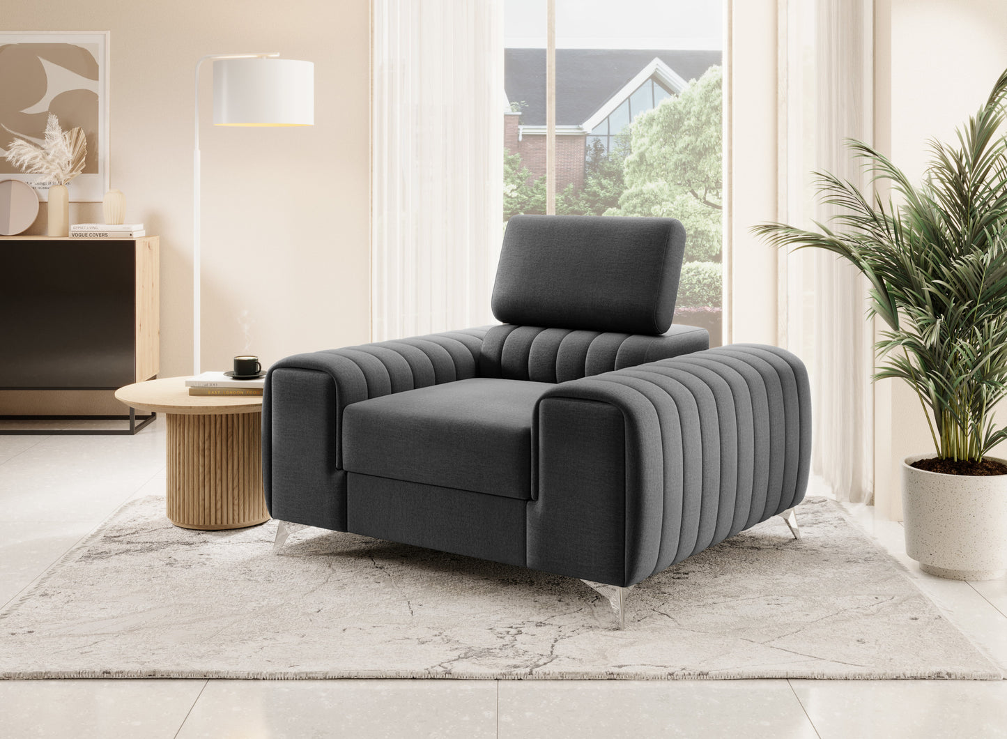 Fotel Laurence Nube 05 ciemnoszary ustawiony w eleganckim, jasnym salonie – nowoczesny element wystroju wnętrza.