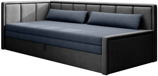 Czarno-grafitowa sofa z funkcją spania i niebieskimi poduszkami – narożny mebel tapicerowany.