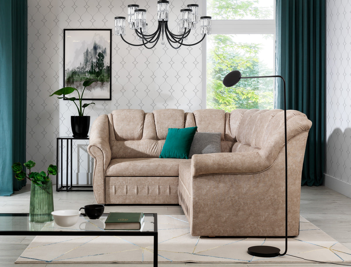 Lewostronny narożnik Lord II w tkaninie Dora 21 z eleganckimi podłokietnikami i dekoracyjnymi przeszyciami. Komfortowy narożnik do dużego salonu zapewniający wygodę codziennego odpoczynku oraz stylowy wygląd wnętrza.