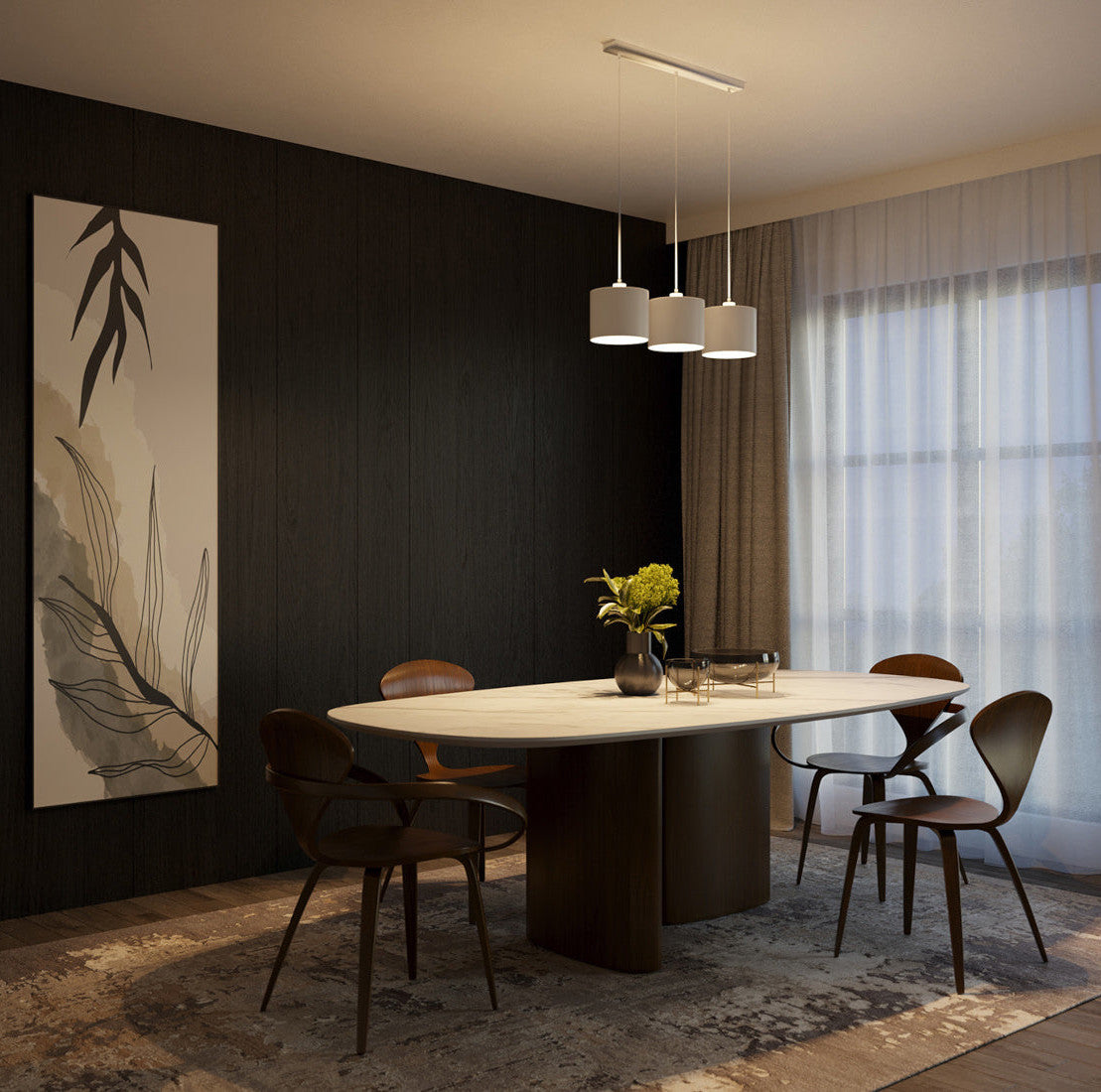 Włączona lampa wisząca Vespillo z trzema abażurami, emitująca ciepłe światło nad stołem jadalnianym, w wieczornej aranżacji salonu z ciemną ścianą.