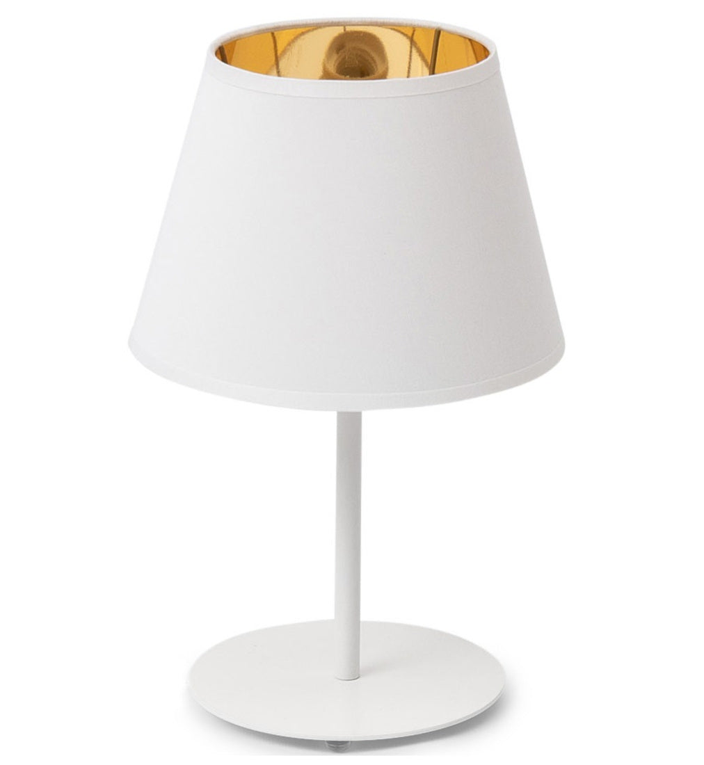 Lampa nocna Vespillo 1a – cylindryczny biały abażur o trapezowym profilu osadzony na smukłej, metalowej nóżce i okrągłej podstawie w tym samym białym kolorze, widziane na białym tle.