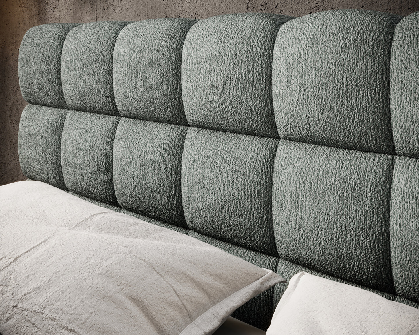 Zbliżenie na tapicerowany zagłówek łóżka Magentta Touch 100 zielony, o miękkiej fakturze i nowoczesnym pikowaniu.