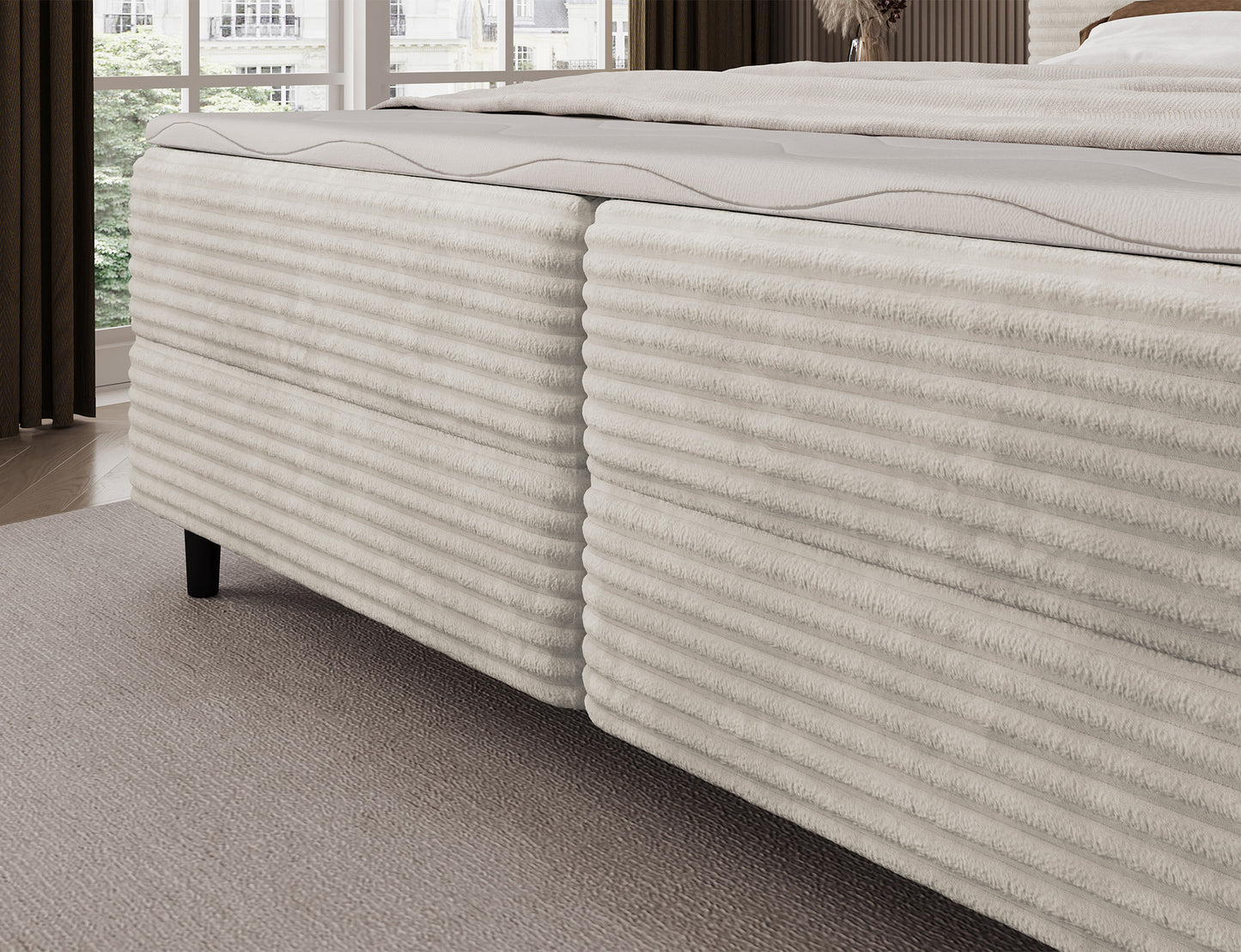 Korpus łóżka Cortiko ELTAP w tkaninie Modullo 01, biały kolor, eleganckie wykończenie i czarne nogi na tle jasnej podłogi