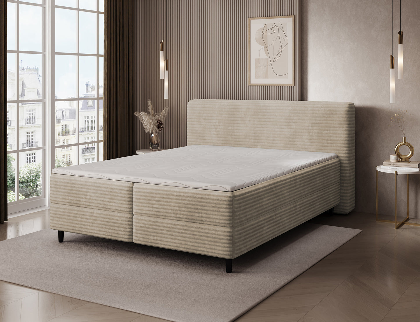 Jasnobeżowe łóżko Cortiko ELTAP w tkaninie Modullo 18, widoczny biały materac i topper, ryflowany bok oraz eleganckie czarne nóżki
