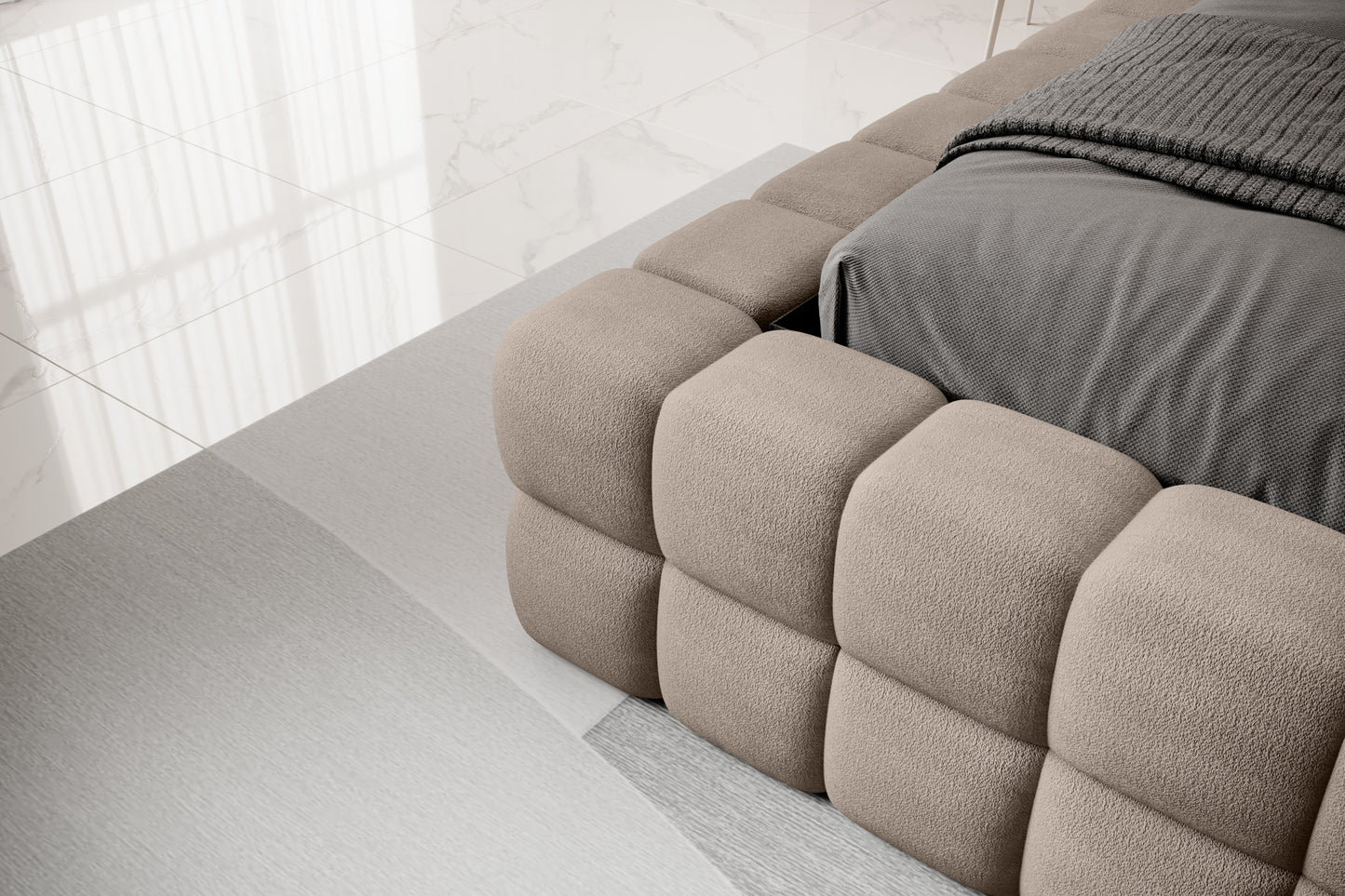 Detal narożnika łóżka Dizzle 180x200 cm w tkaninie Amore 20 jasnobrązowy, ukazujący tapicerowane wykończenie w stylowym i eleganckim wnętrzu.