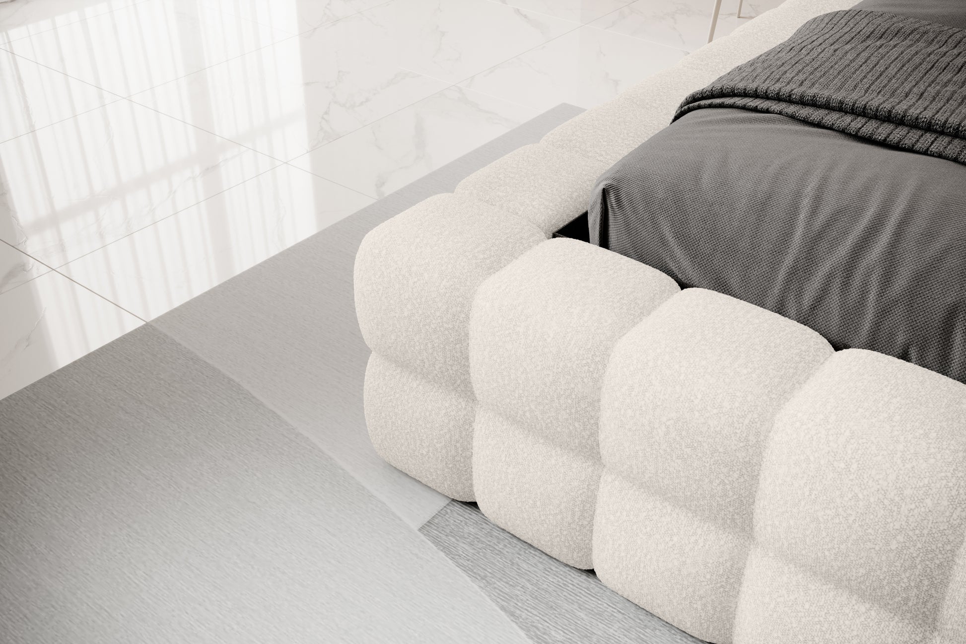 Detal narożnika łóżka Dizzle 160x200 cm w tkaninie Jaffray 01 biały, ukazujący miękkie, tapicerowane wykończenie w stylowym, minimalistycznym wnętrzu.