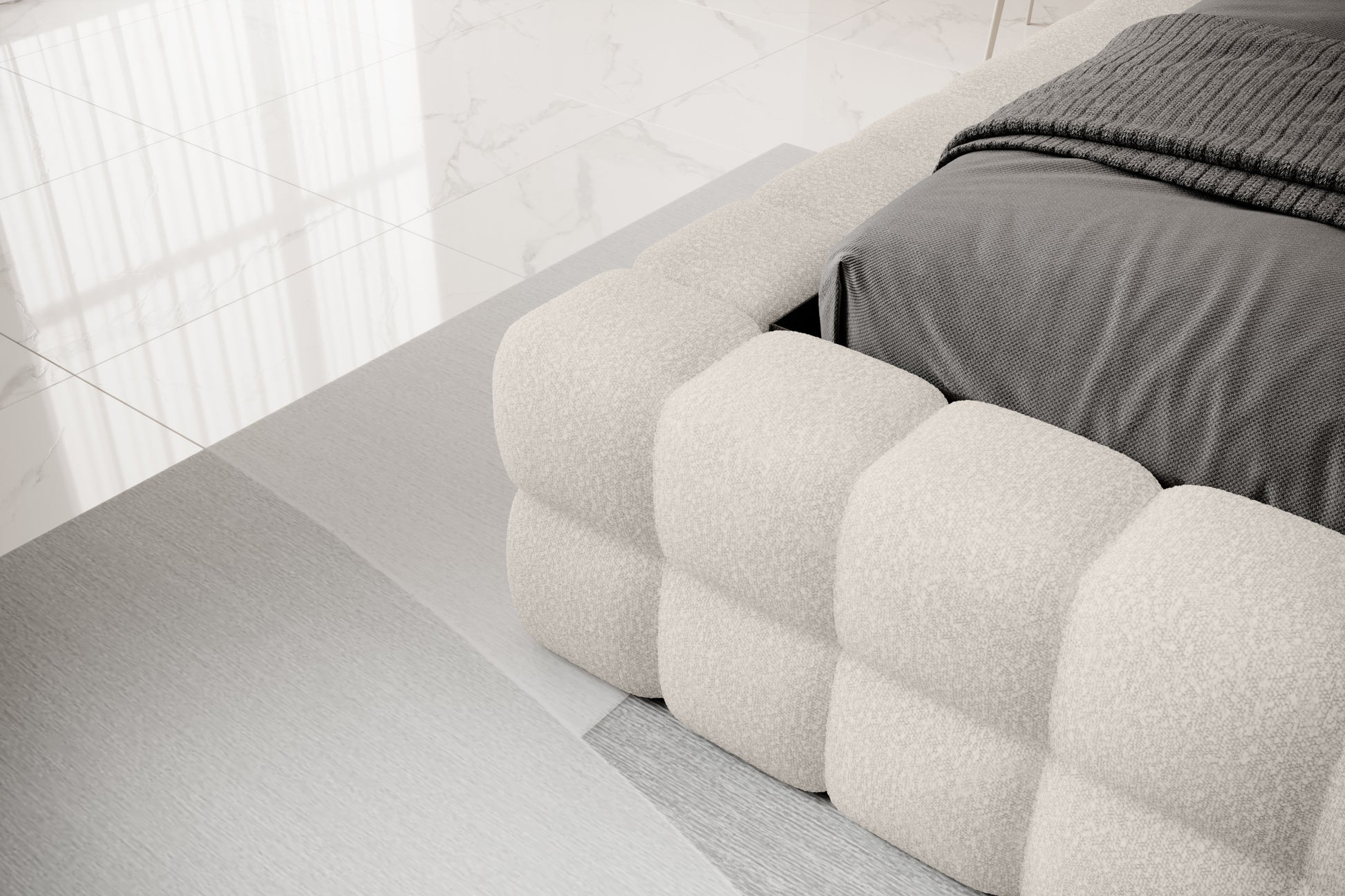 Detal narożnika łóżka Dizzle 180x200 cm w tkaninie Jaffray 18 jasnobeżowy, ukazujący miękkie, tapicerowane wykończenie w stylowym, minimalistycznym wnętrzu.