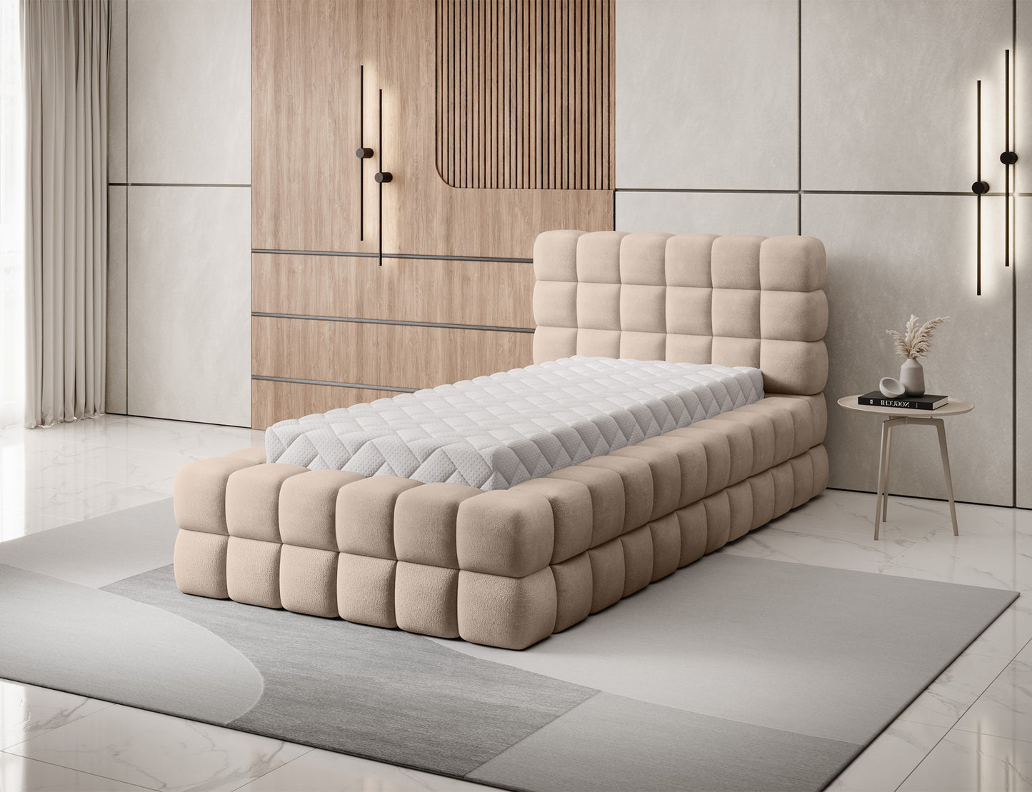 Łóżko Dizzle 90 Amore 18 w kolorze beżowym, ujęcie z widocznym materacem i nowoczesnym pikowanym wykończeniem boków.