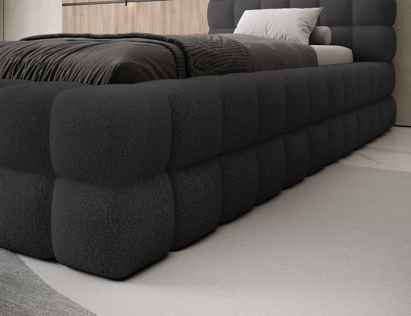 Bok łóżka jednoosobowego Dizzle I 90x200 w tkaninie Royal 05 ciemnoszary, szczegół tapicerowanego korpusu.