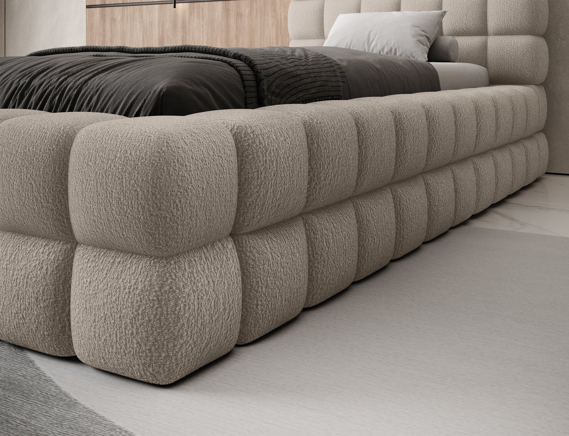 Łóżko Dizzle 90x200 Royal 18 jasnobeżowy, widok na bok korpusu, wyraźna faktura tkaniny i zaokrąglone kształty.