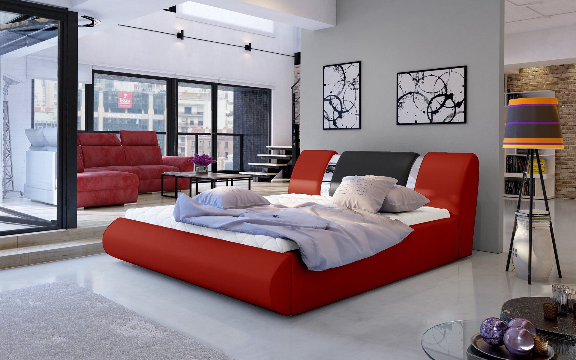 Łóżko Flavio 180x200 cm w kolorze Soft 10 czerwony / Soft 11 czarny ustawione w przestronnej, nowoczesnej sypialni z dużymi oknami i designerskimi dodatkami.