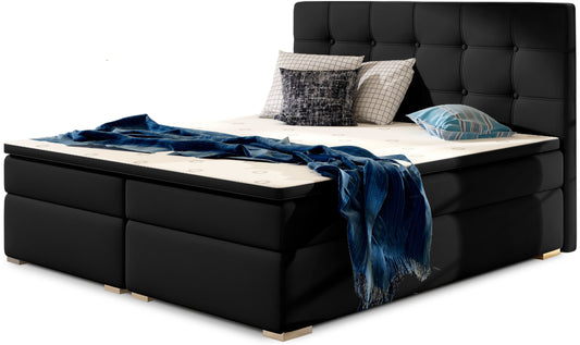 Łóżko kontynentalne Inez 180x200 cm w kolorze Soft 11 czarny, z eleganckim tapicerowanym zagłówkiem pikowanym w kwadraty.